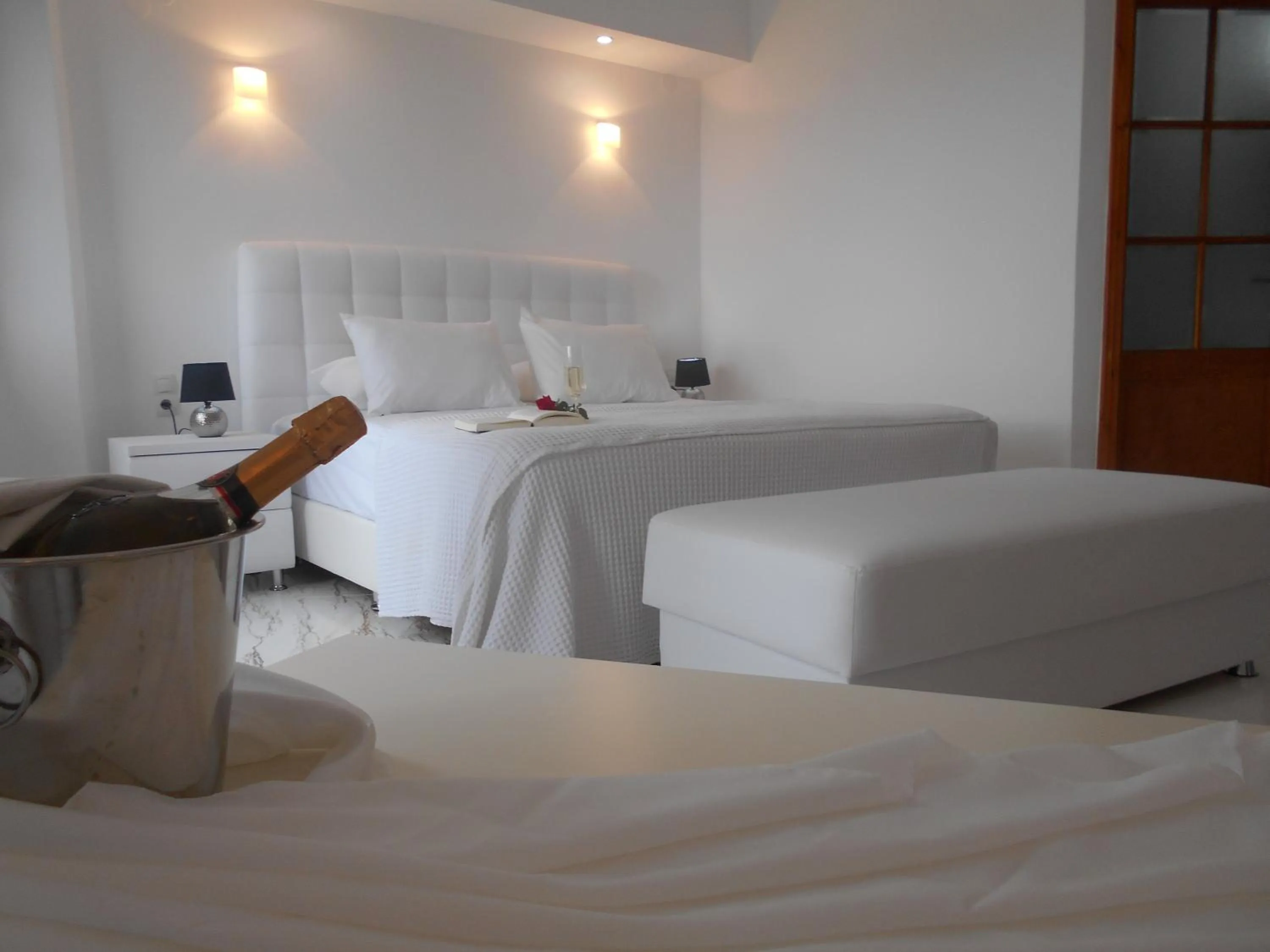 Bed in Kinira Beach Hotel