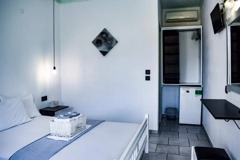 Bed in Kinira Beach Hotel