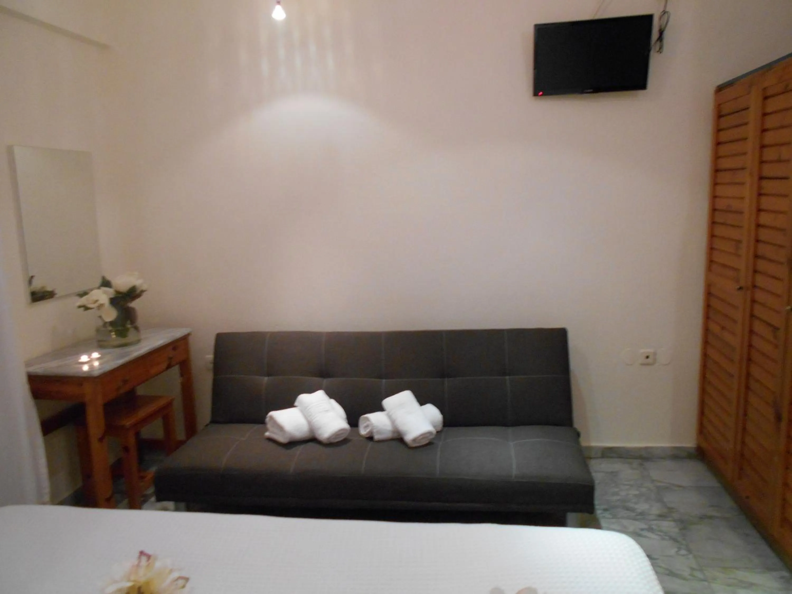 Bed in Kinira Beach Hotel