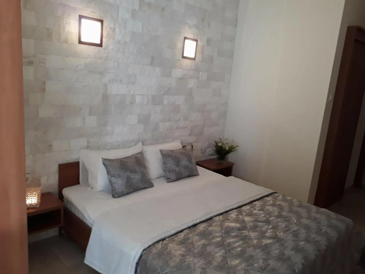 Bed in Kinira Beach Hotel