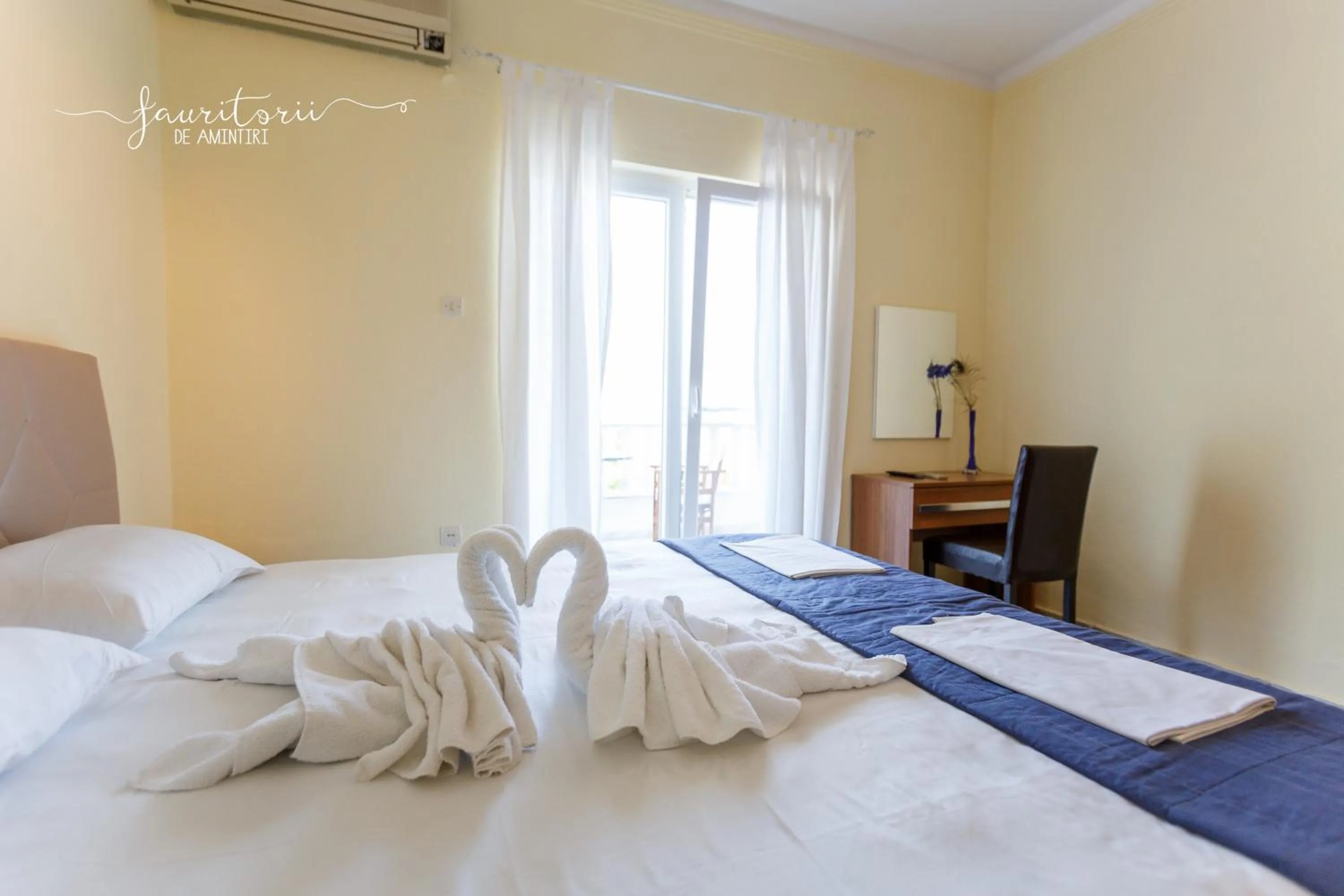 Bed in Kinira Beach Hotel