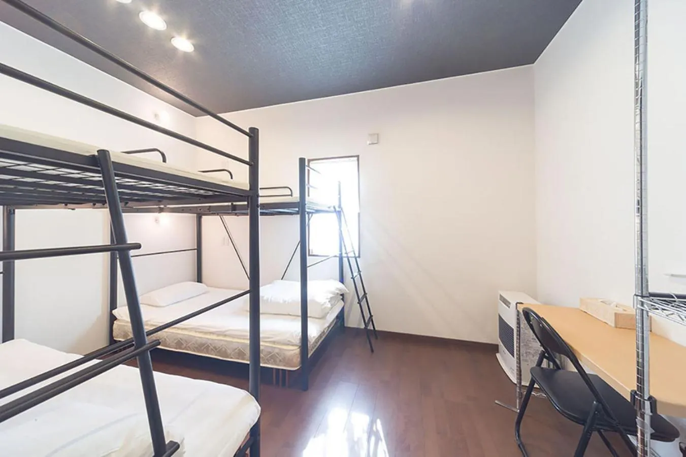 Bed in Guesthouse Nibutani Yanto