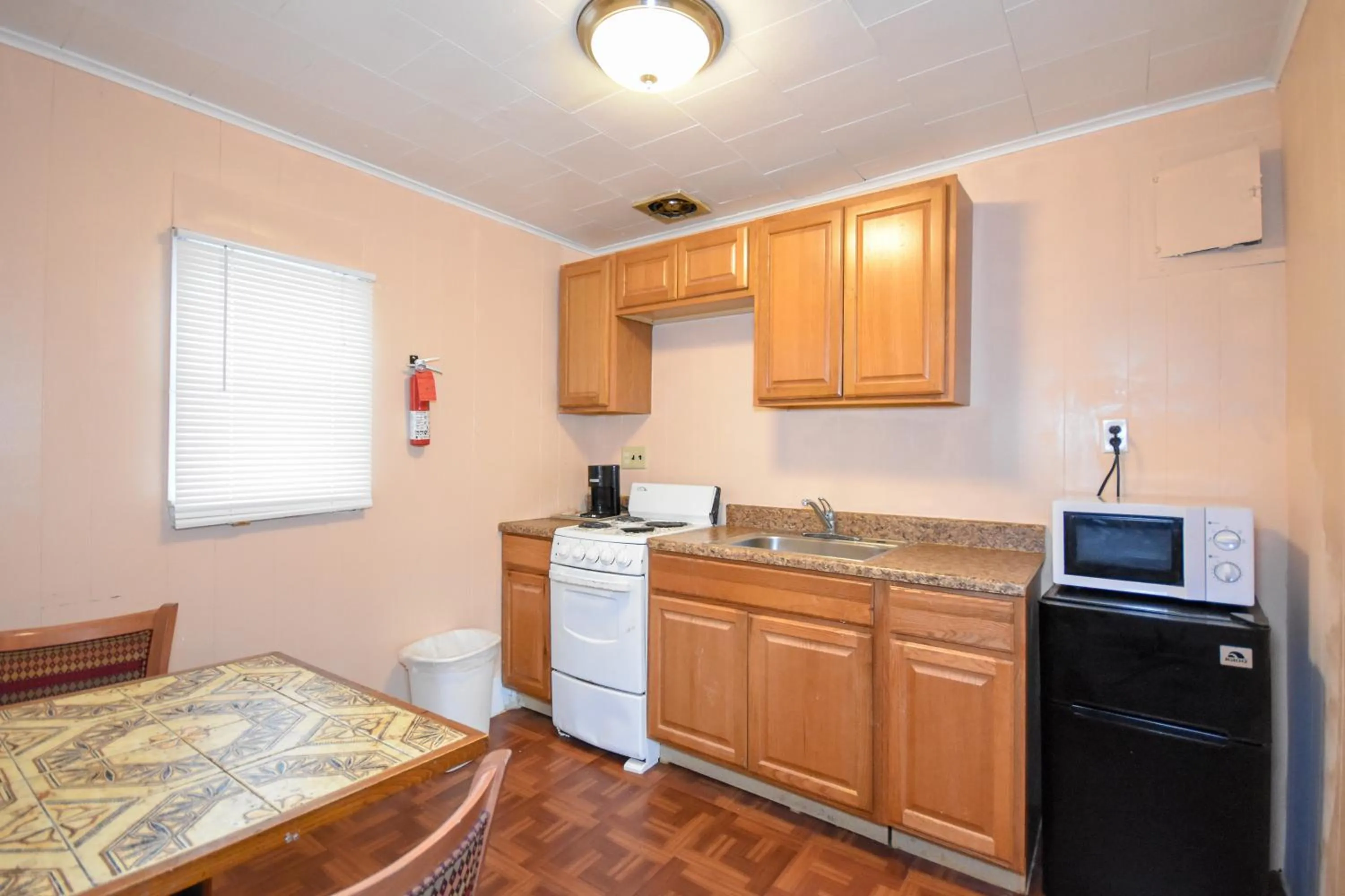 Kitchen or kitchenette in Monticello Inn- Framingham/ Boston