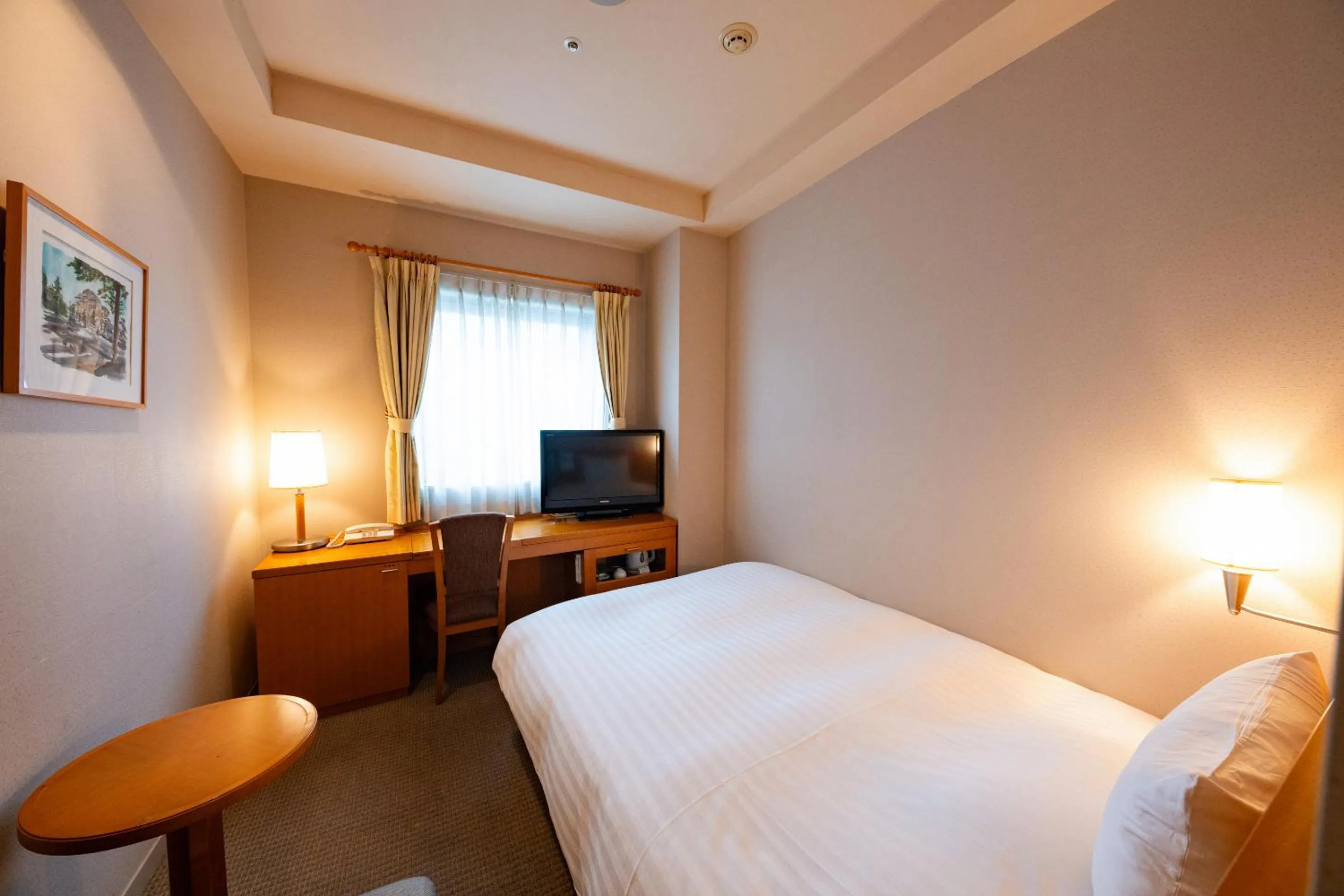 Photo of the whole room, Bed in KKR Hotel Kanazawa