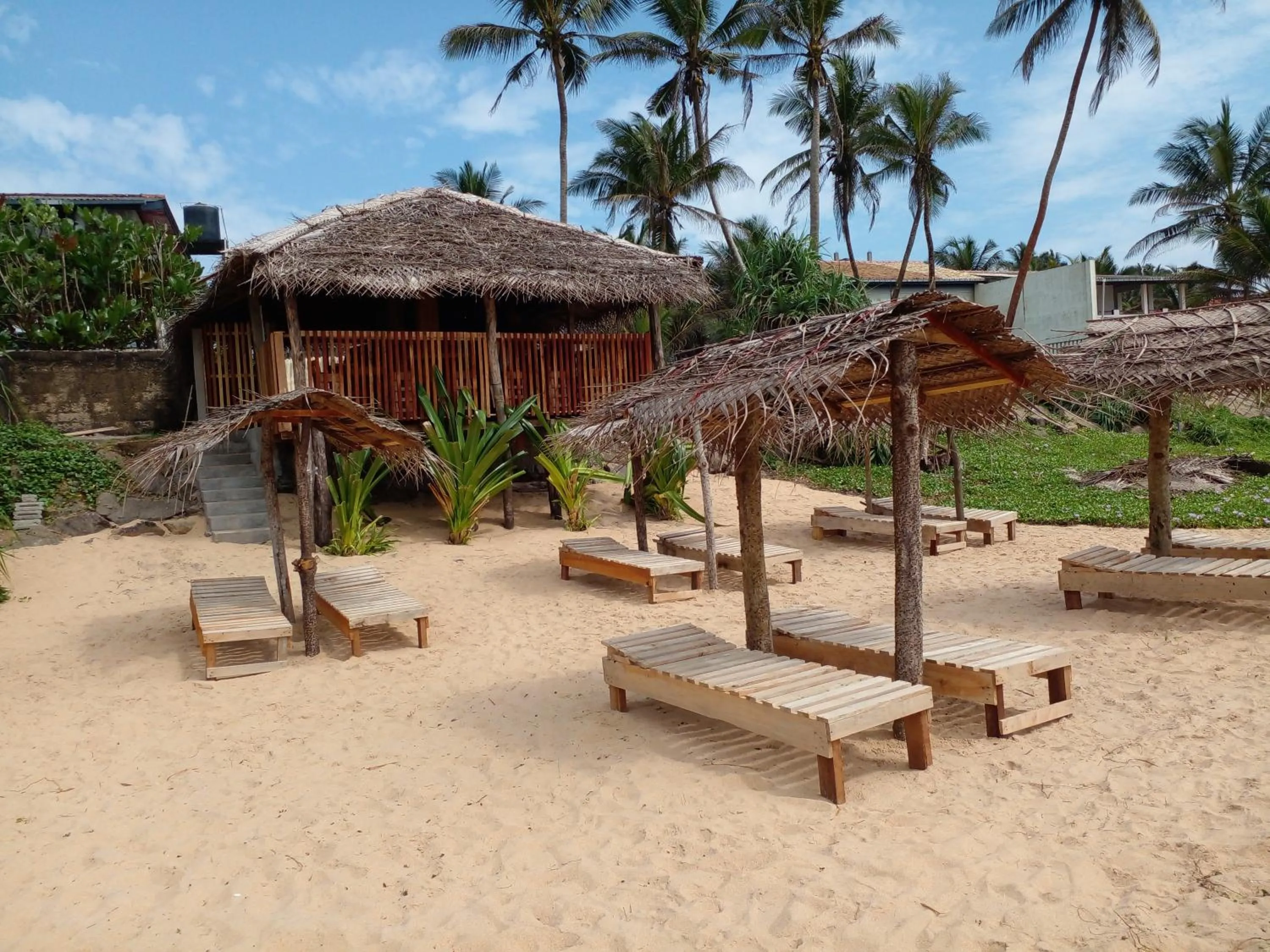 Malika's Yellow House