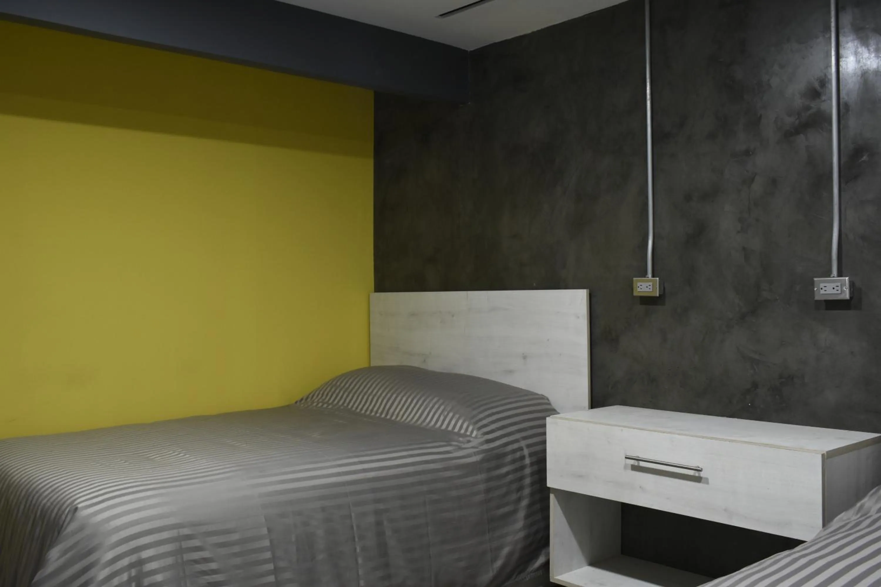 Bed in TJ Border Suites by Hosted by Me