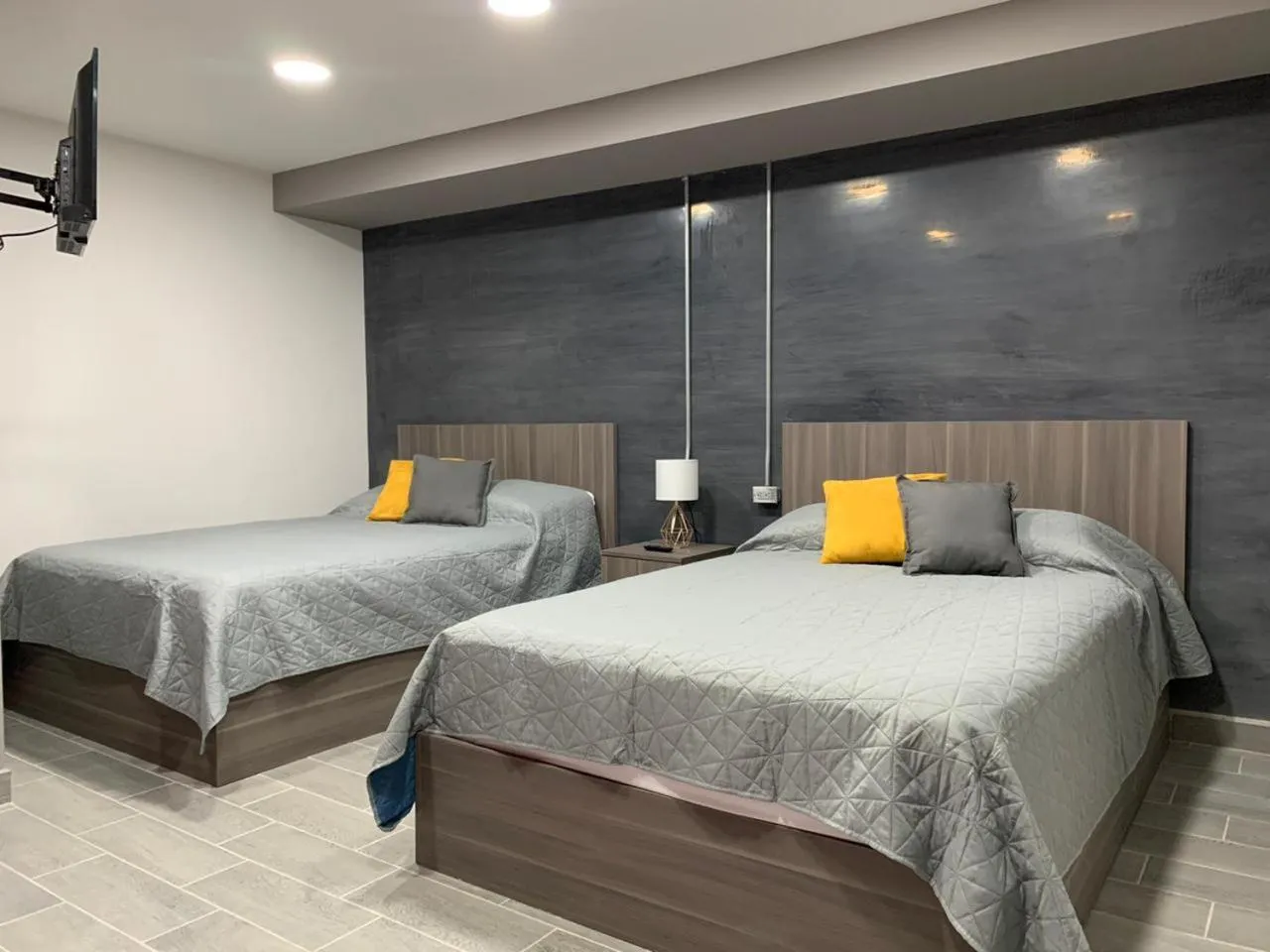 Bed in TJ Border Suites by Hosted by Me