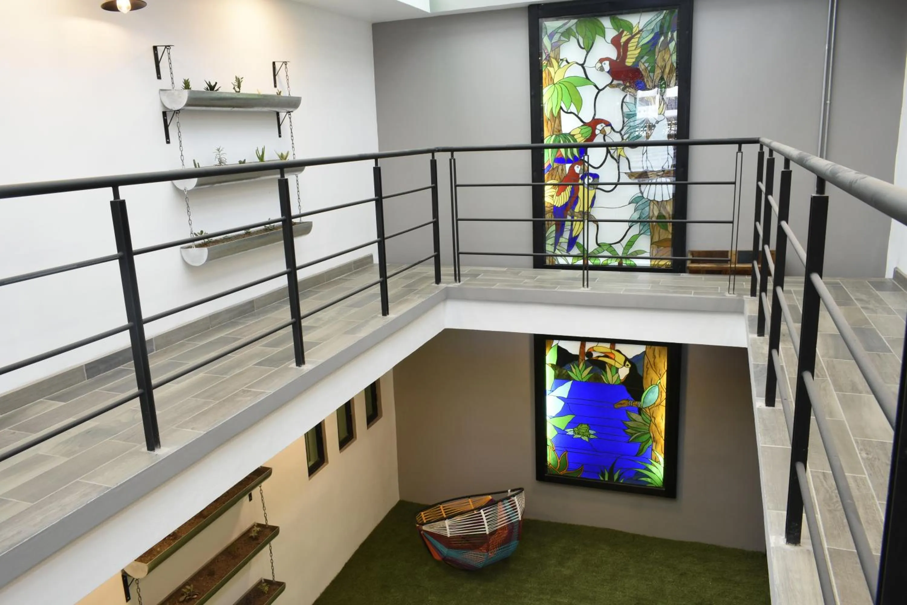 Living room in TJ Border Suites by Hosted by Me