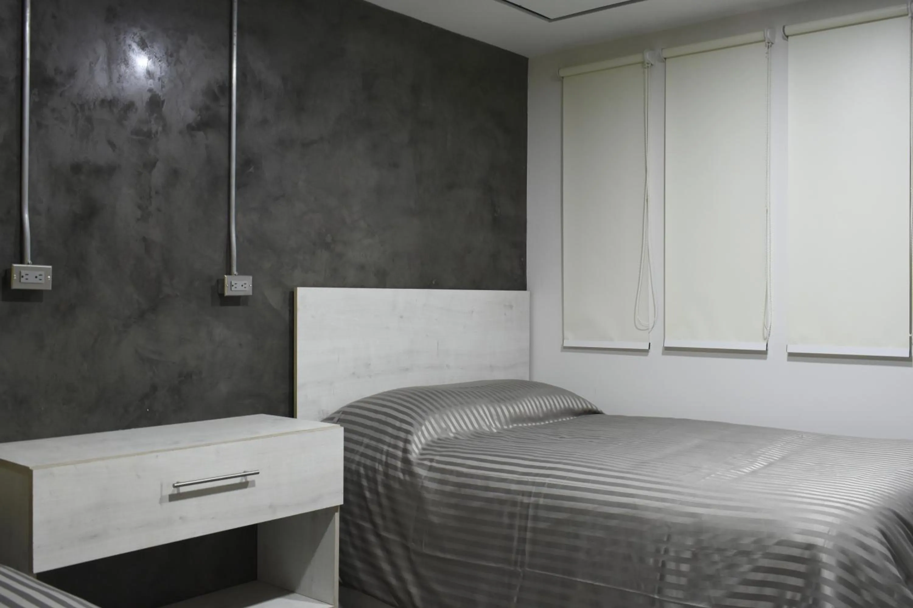 Bed in TJ Border Suites by Hosted by Me