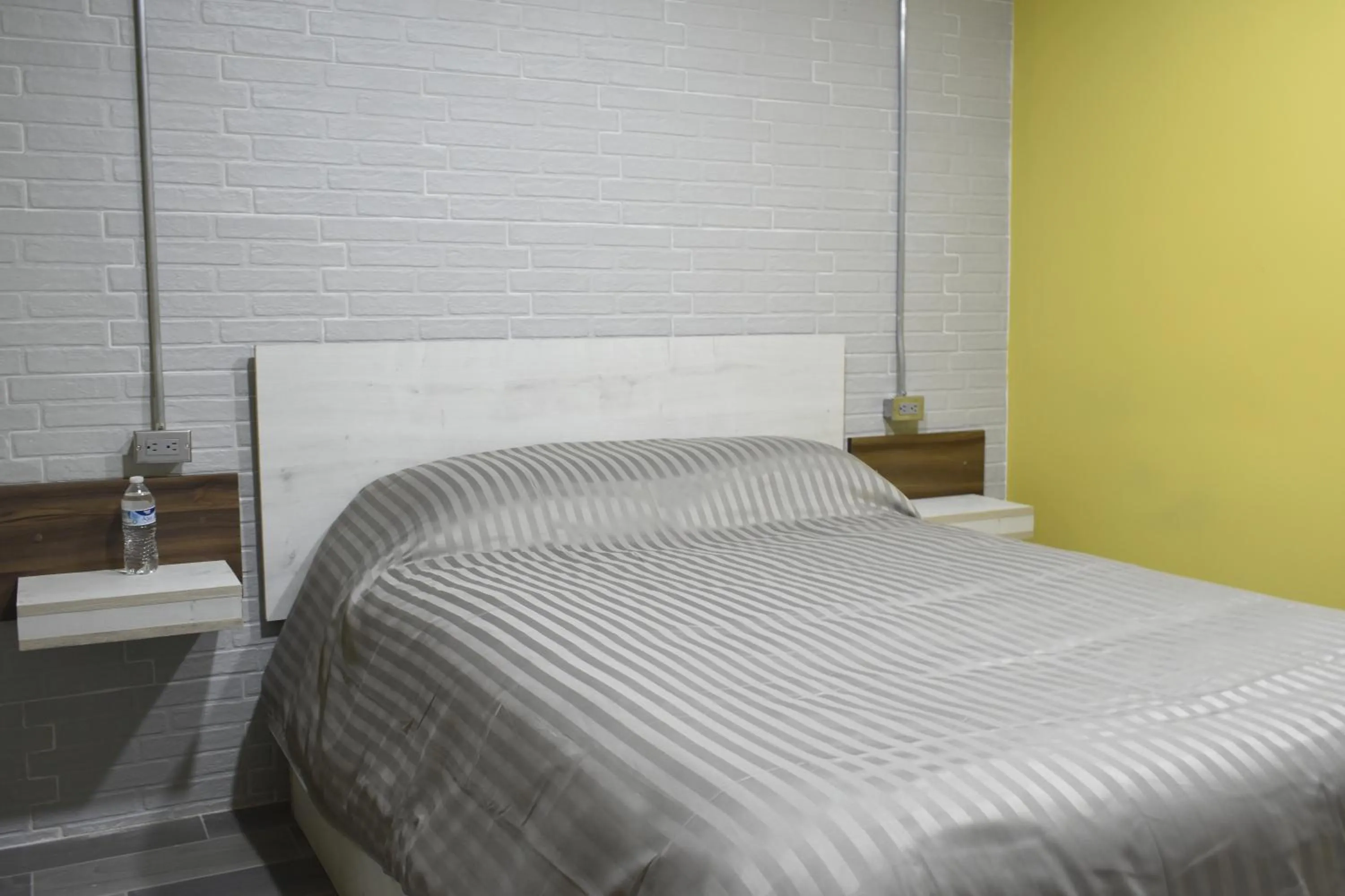 Bed in TJ Border Suites by Hosted by Me