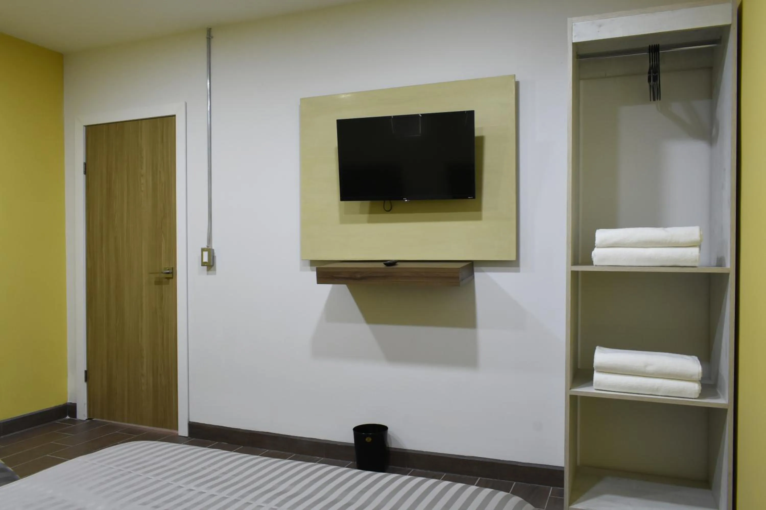 Bed in TJ Border Suites by Hosted by Me