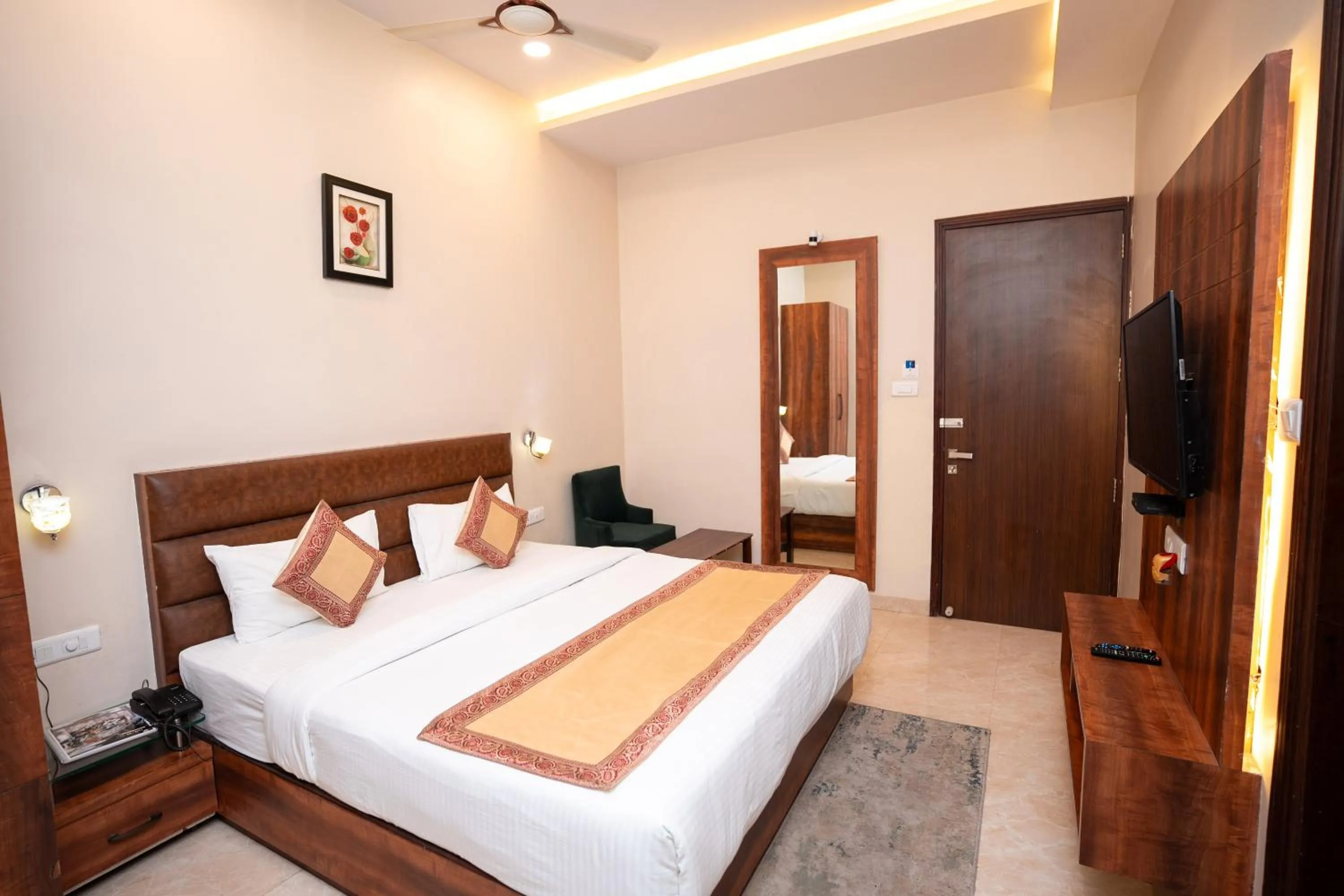 Bed in Hotel Radiance Courtyard