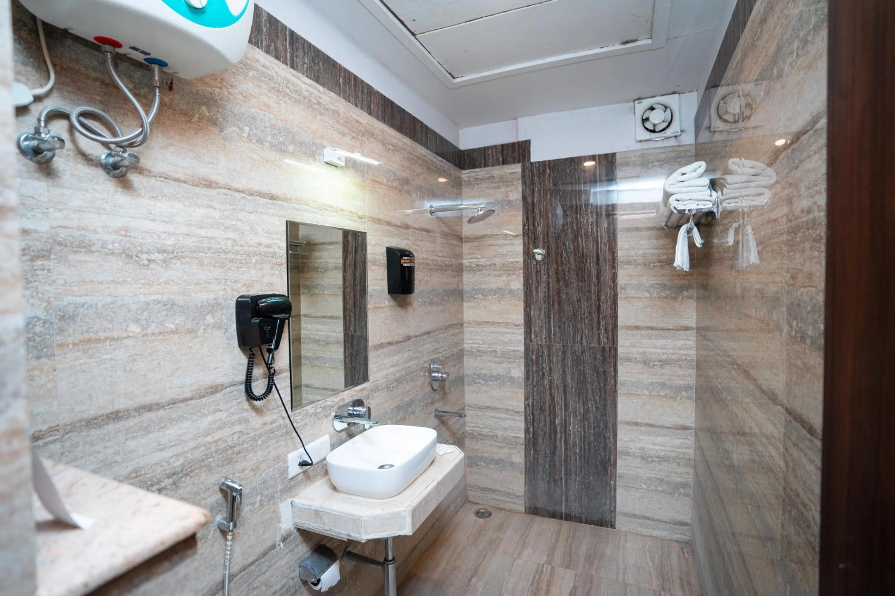 Shower in Hotel Radiance Courtyard