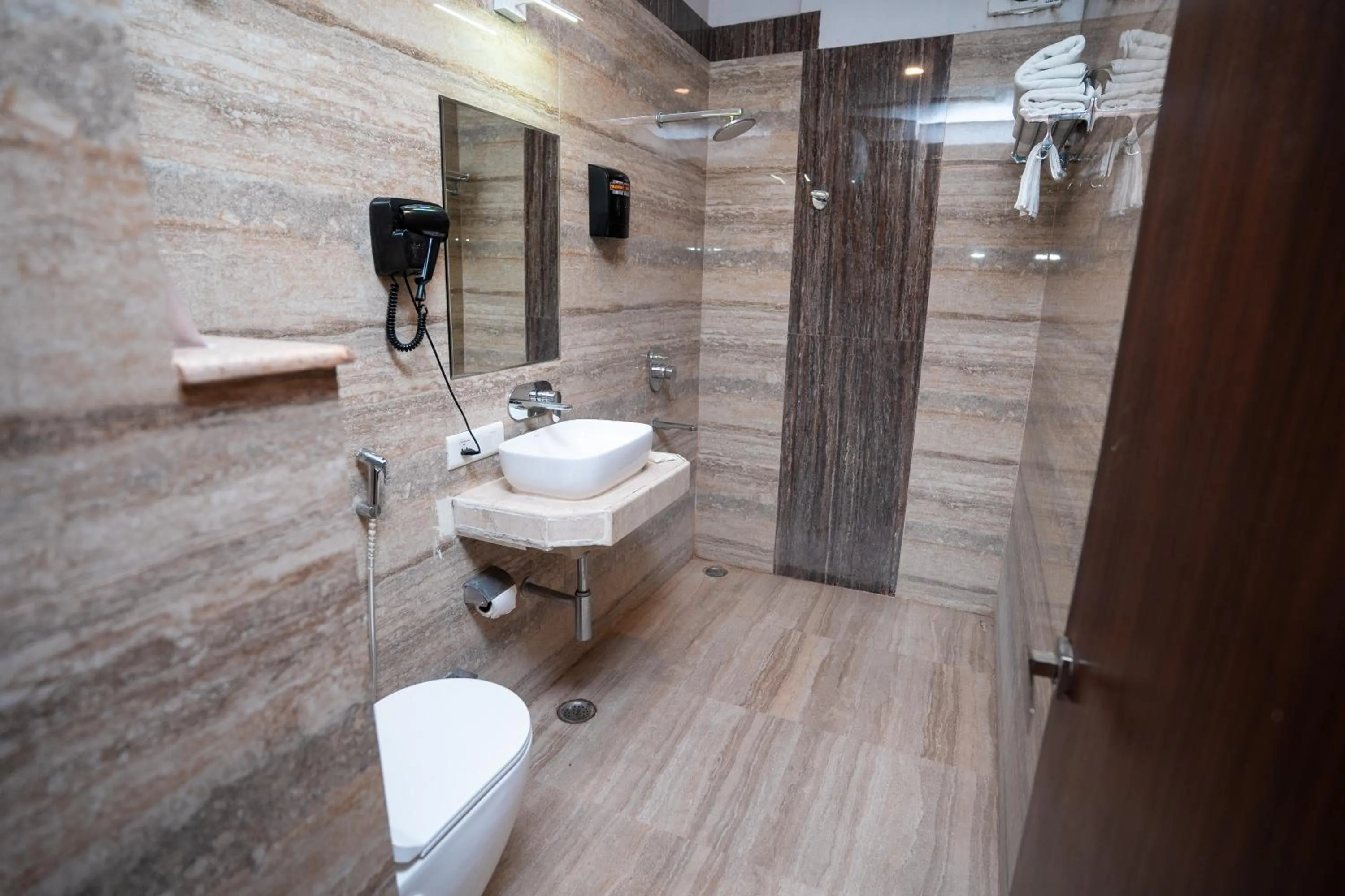 Shower in Hotel Radiance Courtyard