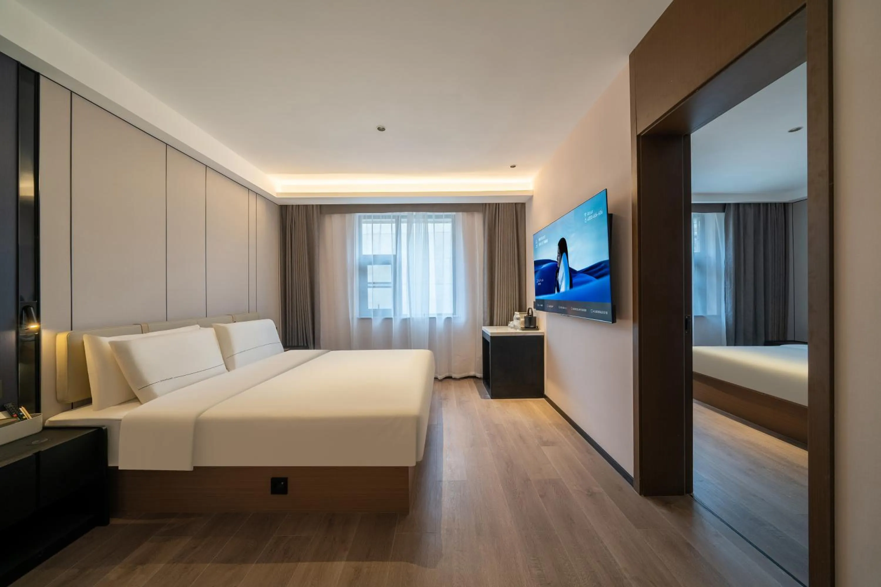 Communal lounge/ TV room, Bed in Atour Hotel Chengdu Wuhou Temple