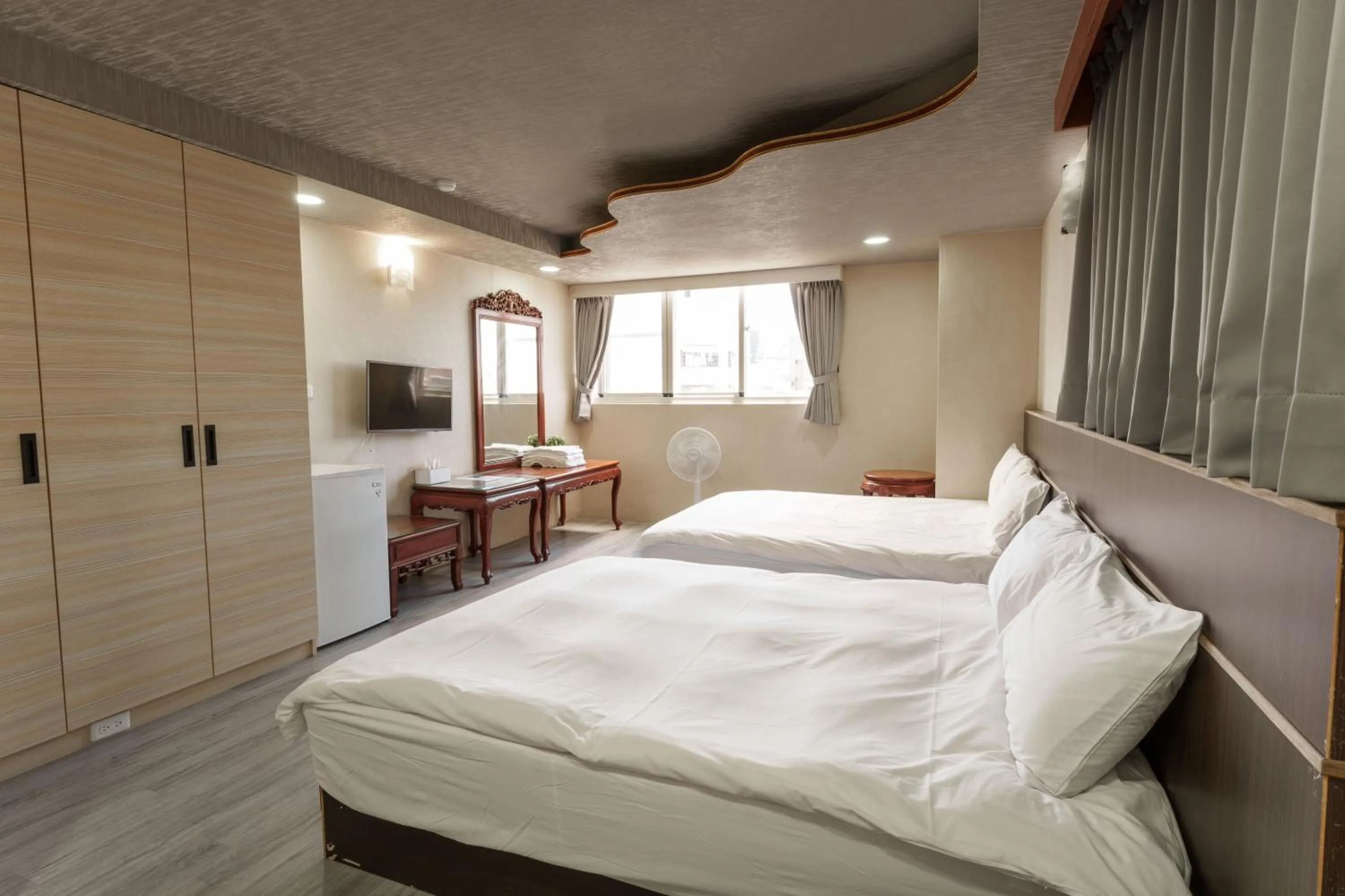 Bedroom, Bed in Love River Inn 愛河日央