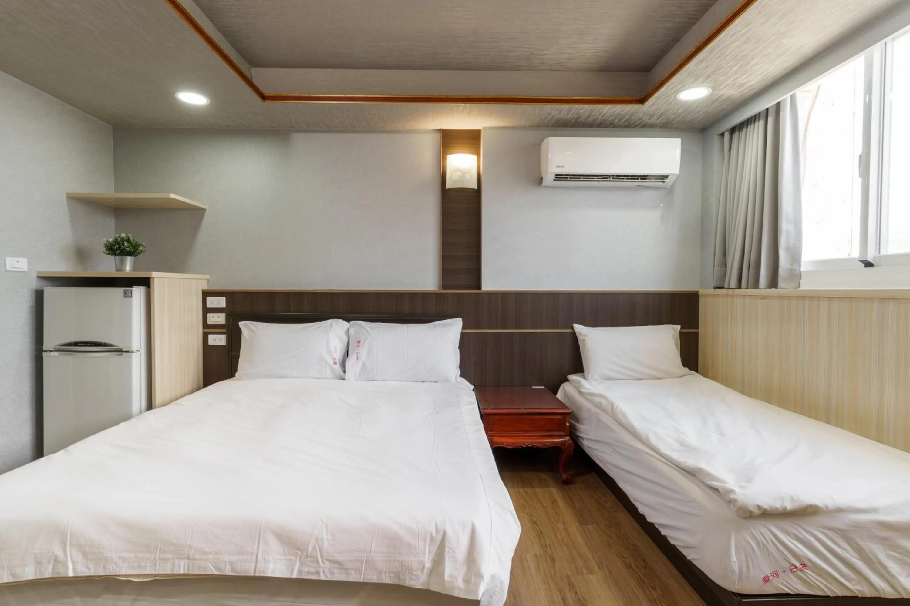 Bedroom, Bed in Love River Inn 愛河日央