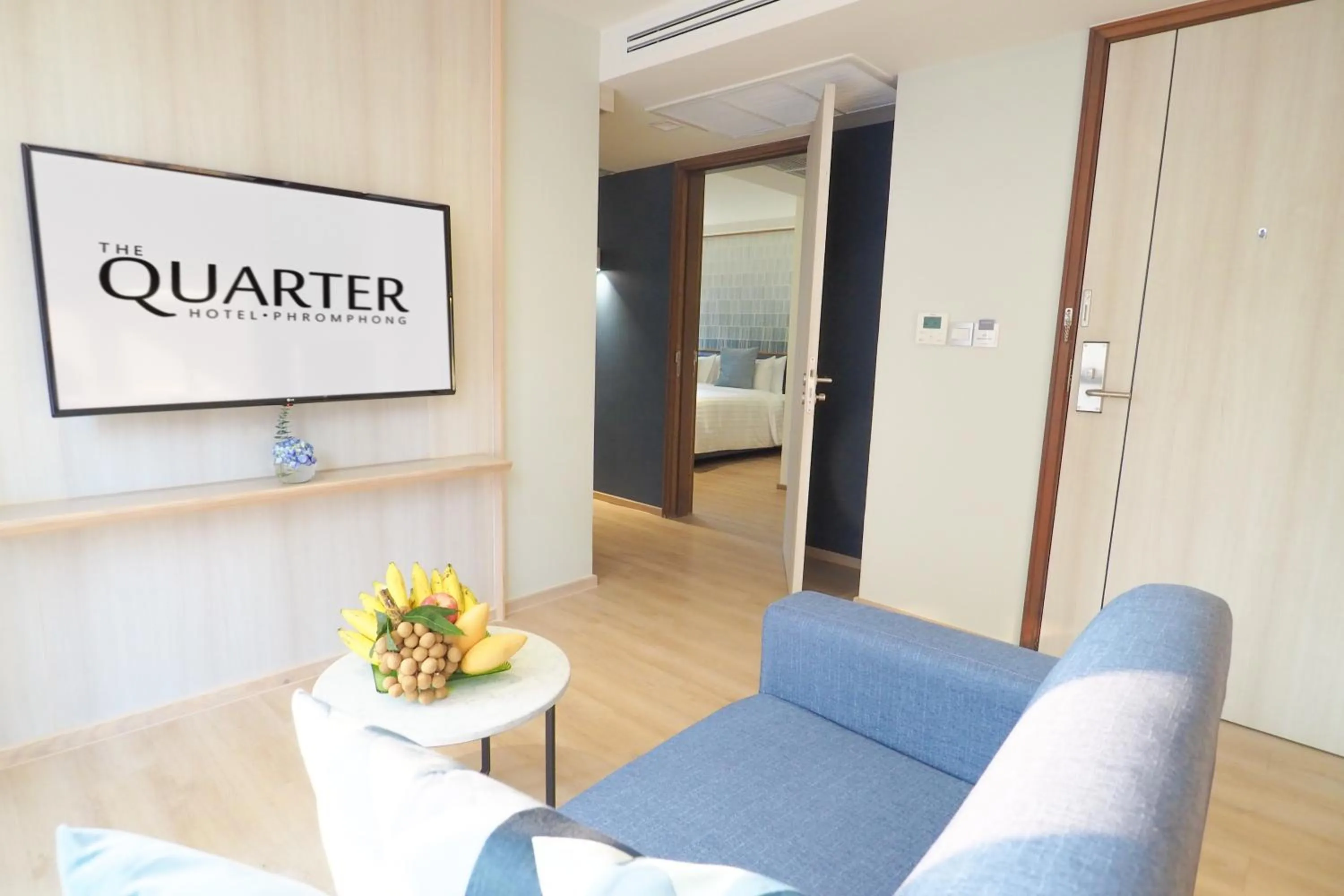 Living room in The Quarter Phromphong by UHG