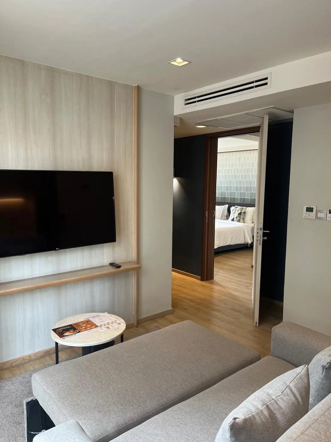 Communal lounge/ TV room, Bed in The Quarter Phromphong by UHG