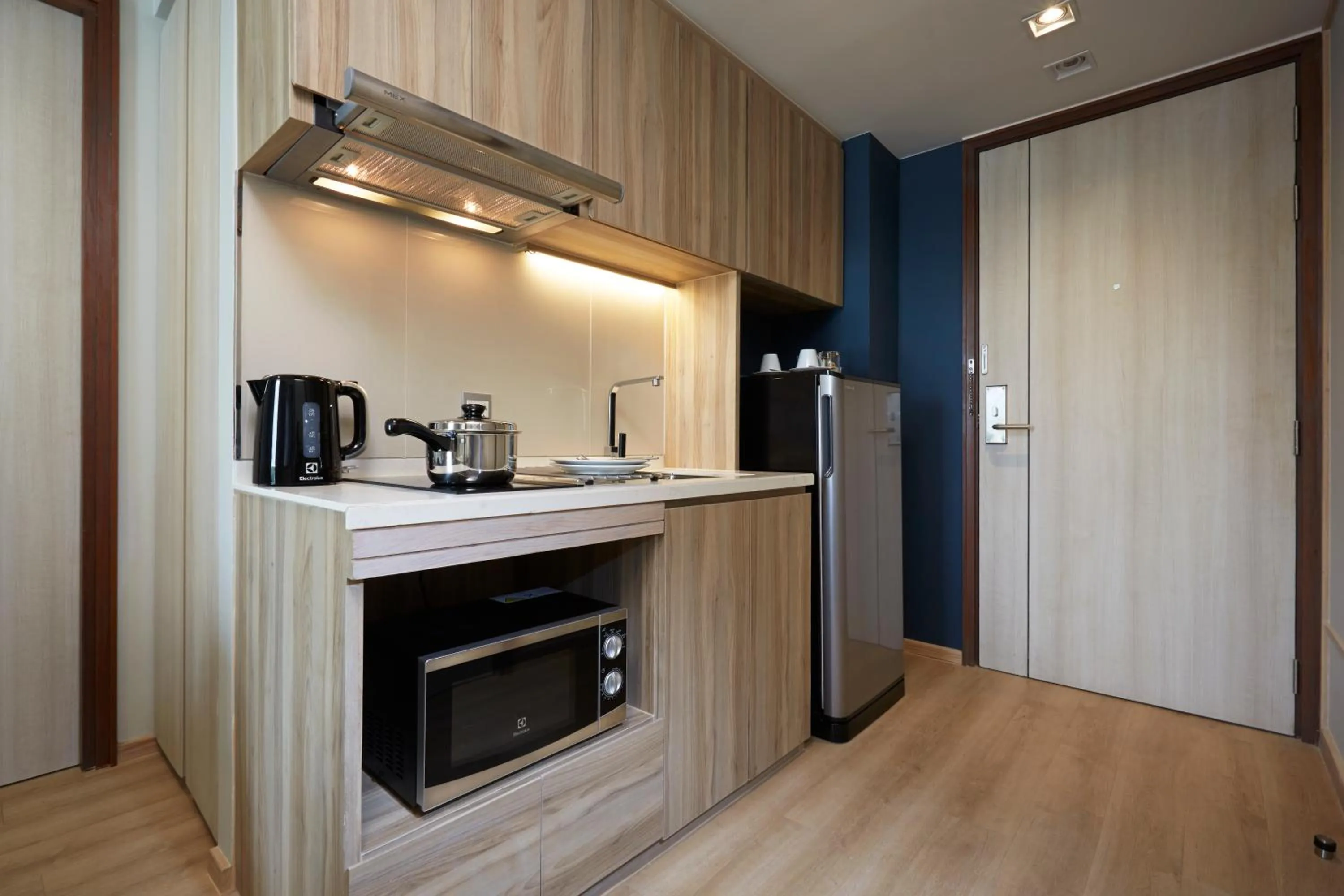 Kitchen or kitchenette in The Quarter Phromphong by UHG