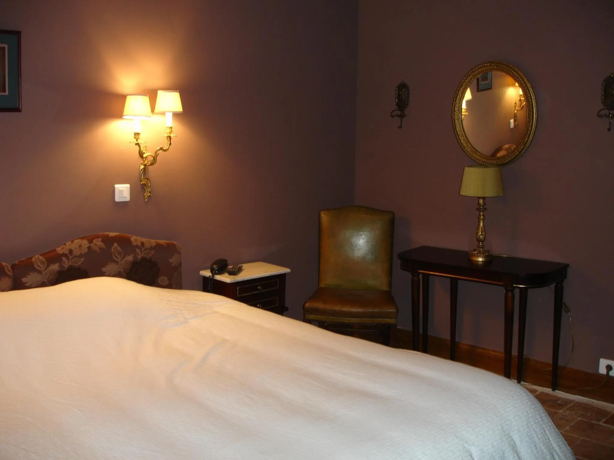 Bed in Le Relais du Lyon d'Or