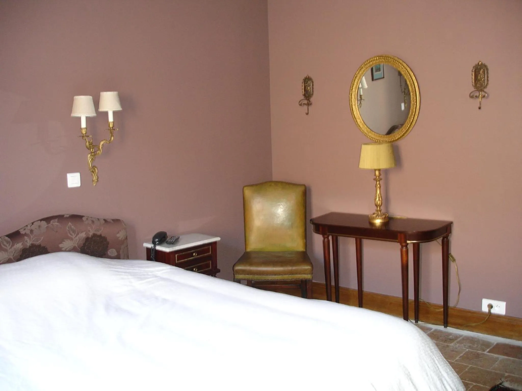 Bed in Le Relais du Lyon d'Or