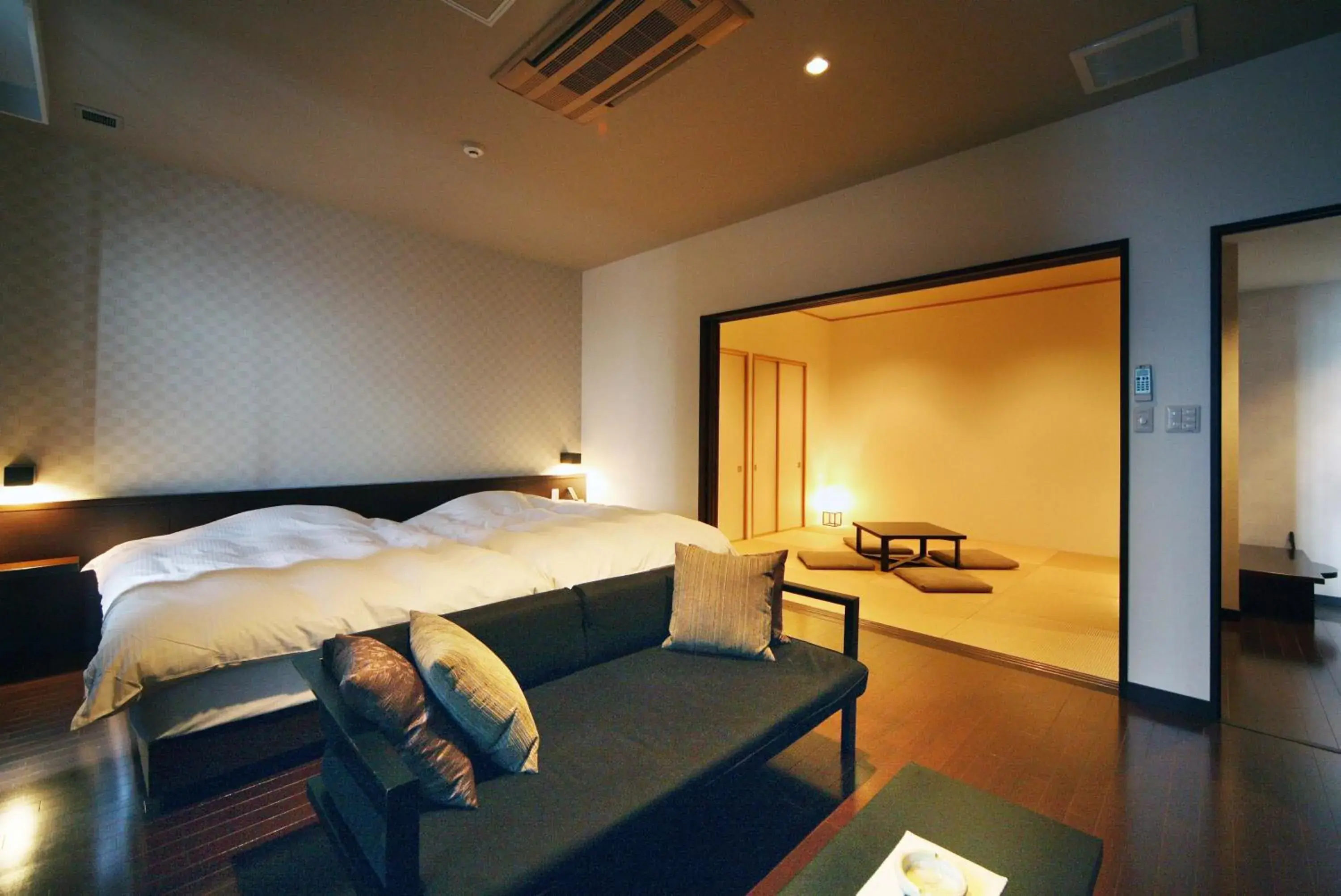 Living room, Bed in AMANE resort SEIKAI Living room, Bed in AMANE resort SEIKAI