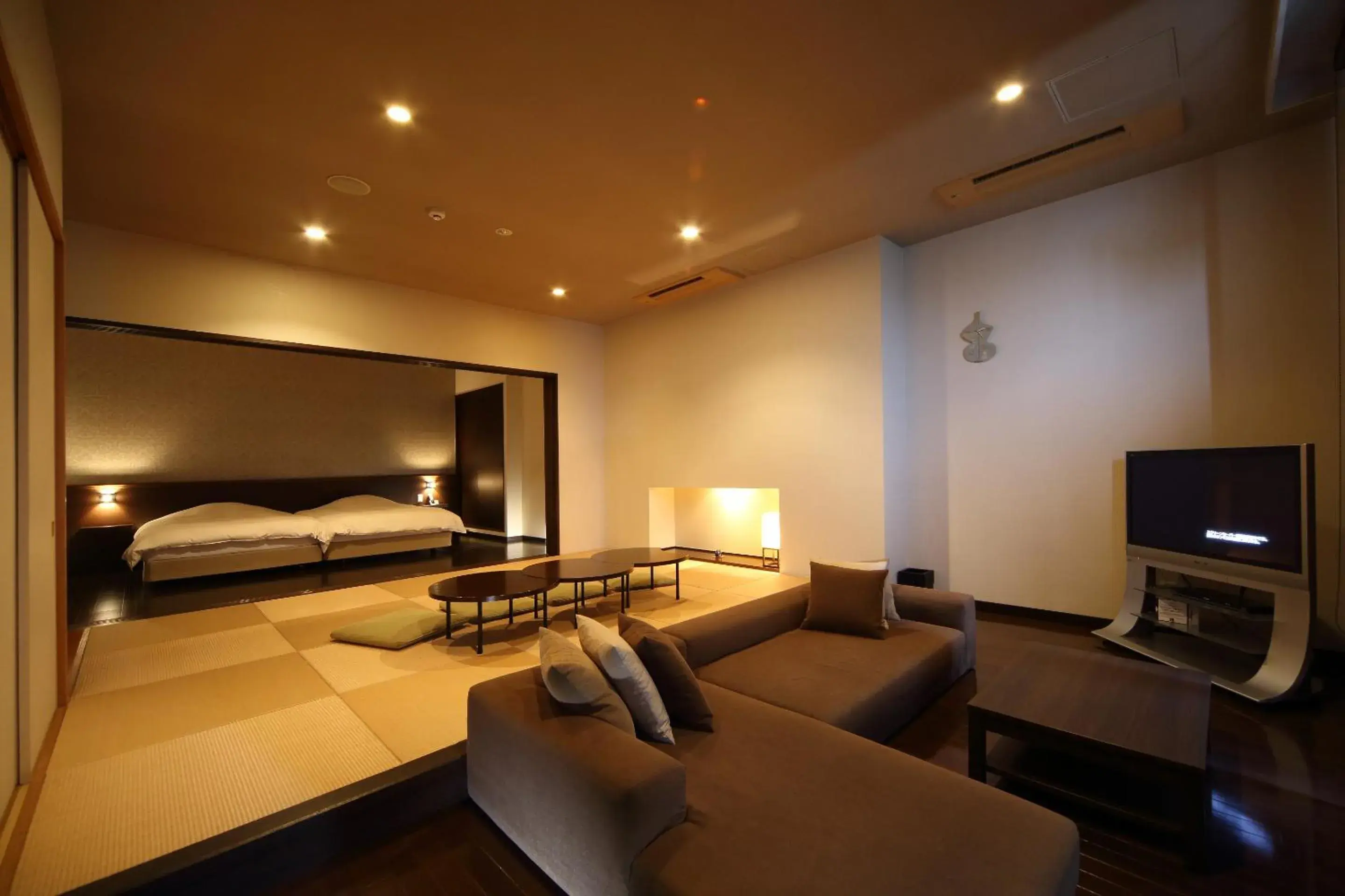 Living room, Bed in AMANE resort SEIKAI Living room, Bed in AMANE resort SEIKAI