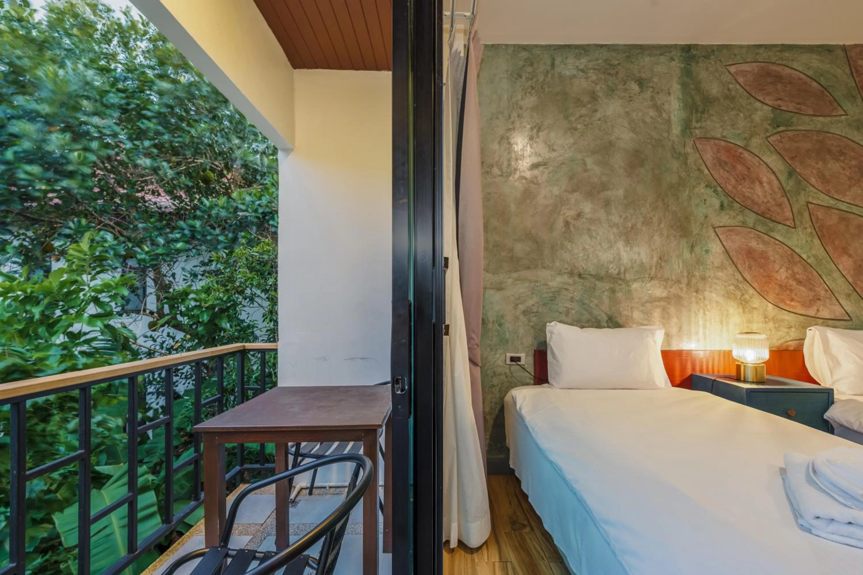 Bed in Coco Paradiso Phuket SHA