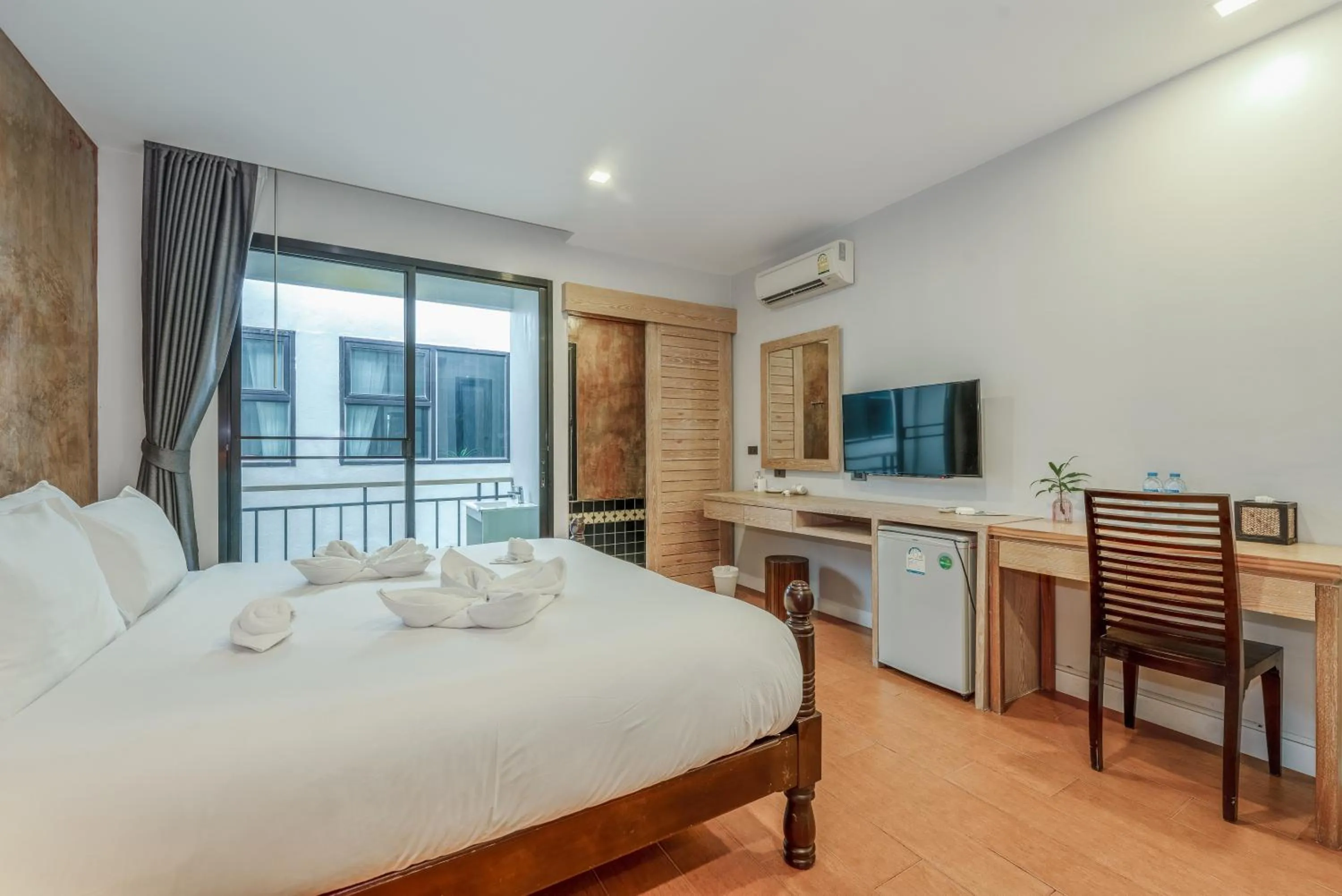 Bed in Coco Paradiso Phuket SHA