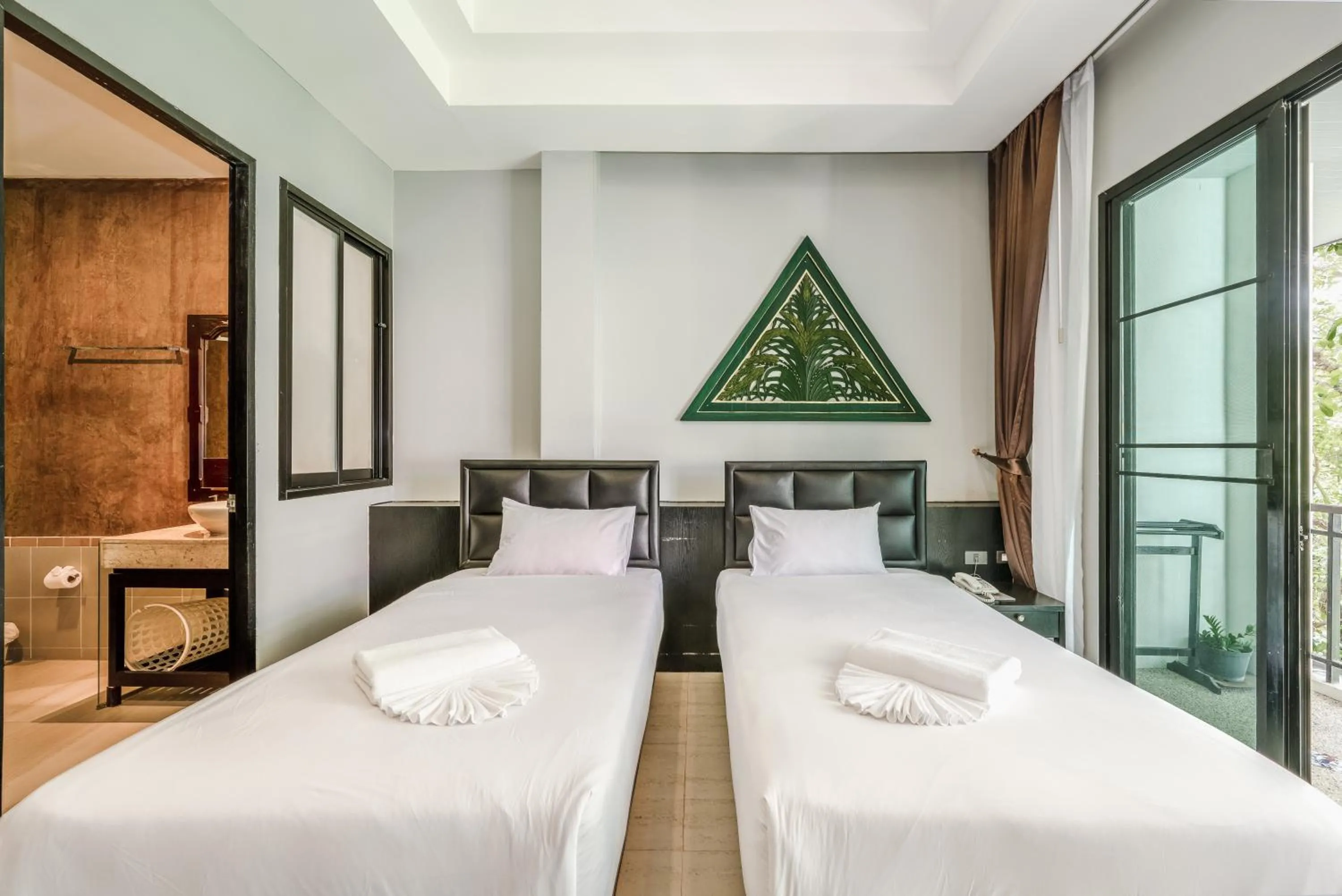 Bed in Coco Paradiso Phuket SHA