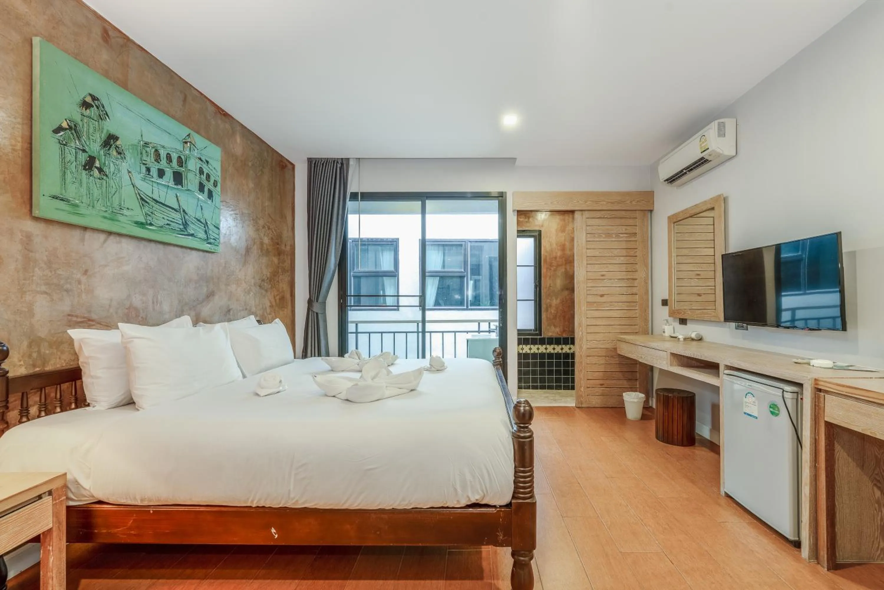 Bed in Coco Paradiso Phuket SHA