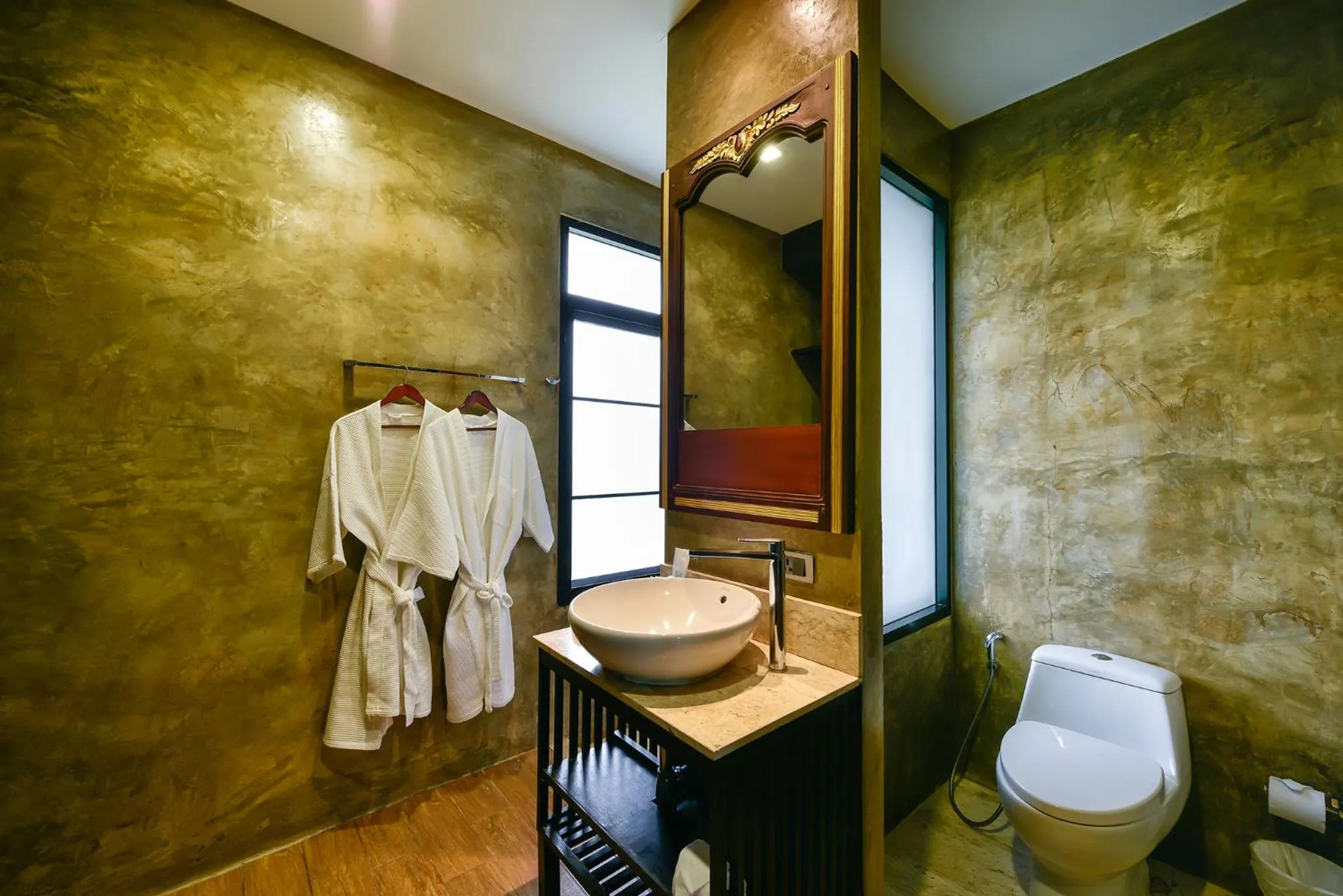 Bathroom in Coco Paradiso Phuket SHA