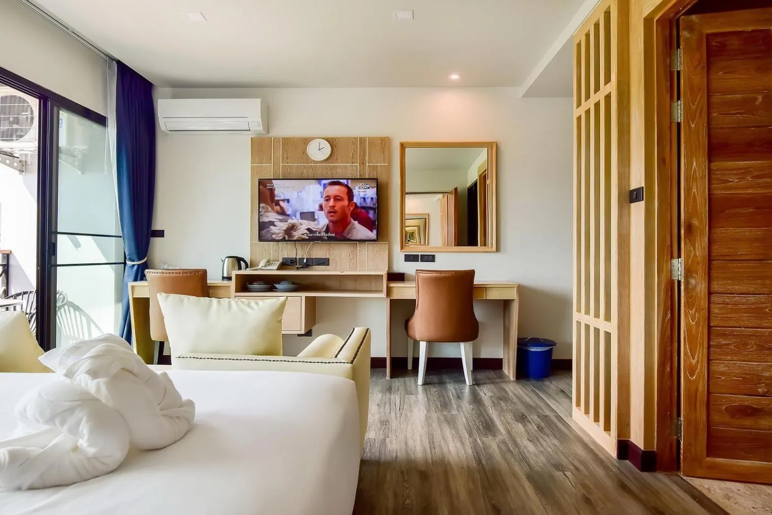 Living room, Bed in Coco Paradiso Phuket SHA