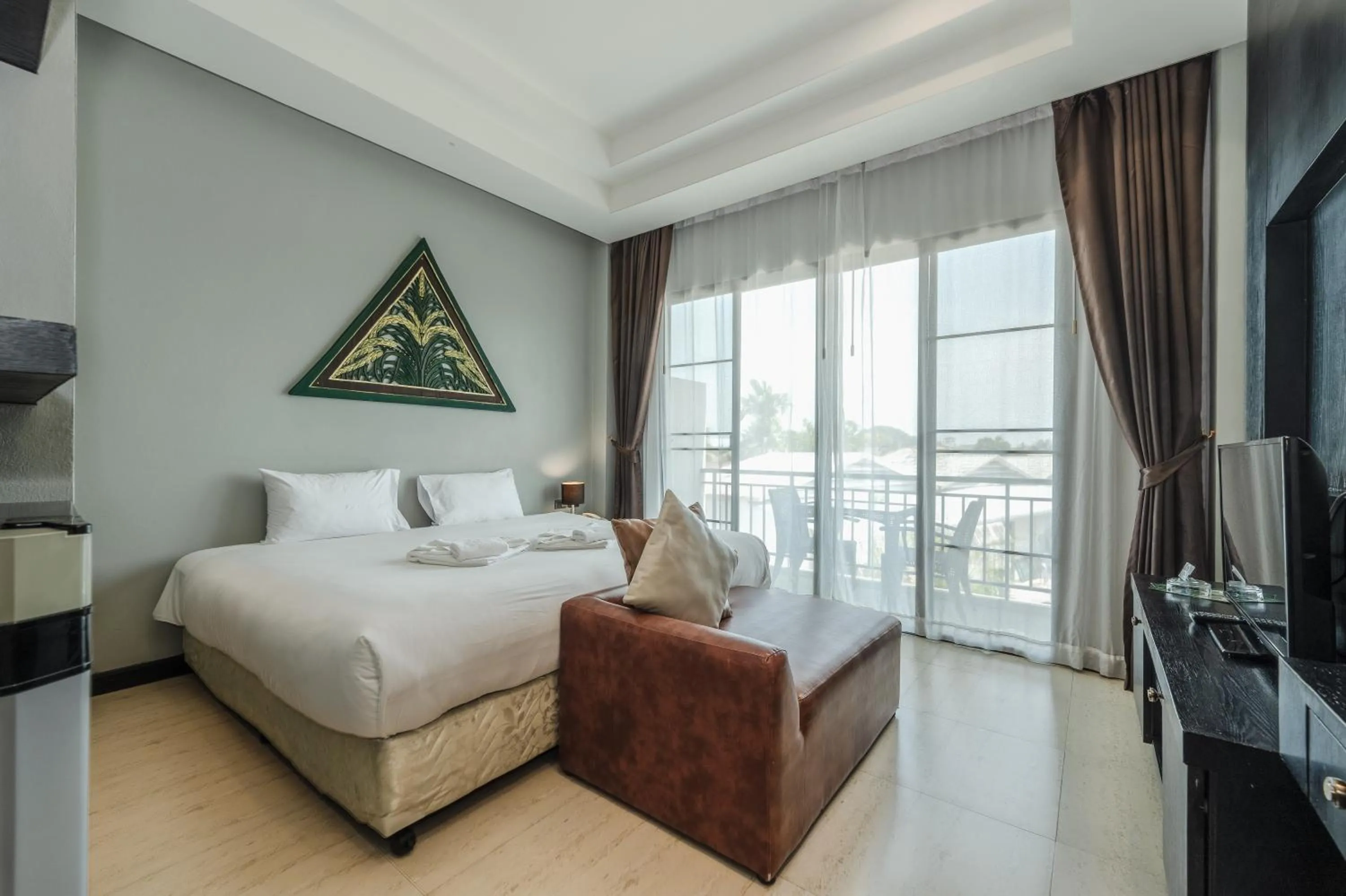 Bed in Coco Paradiso Phuket SHA