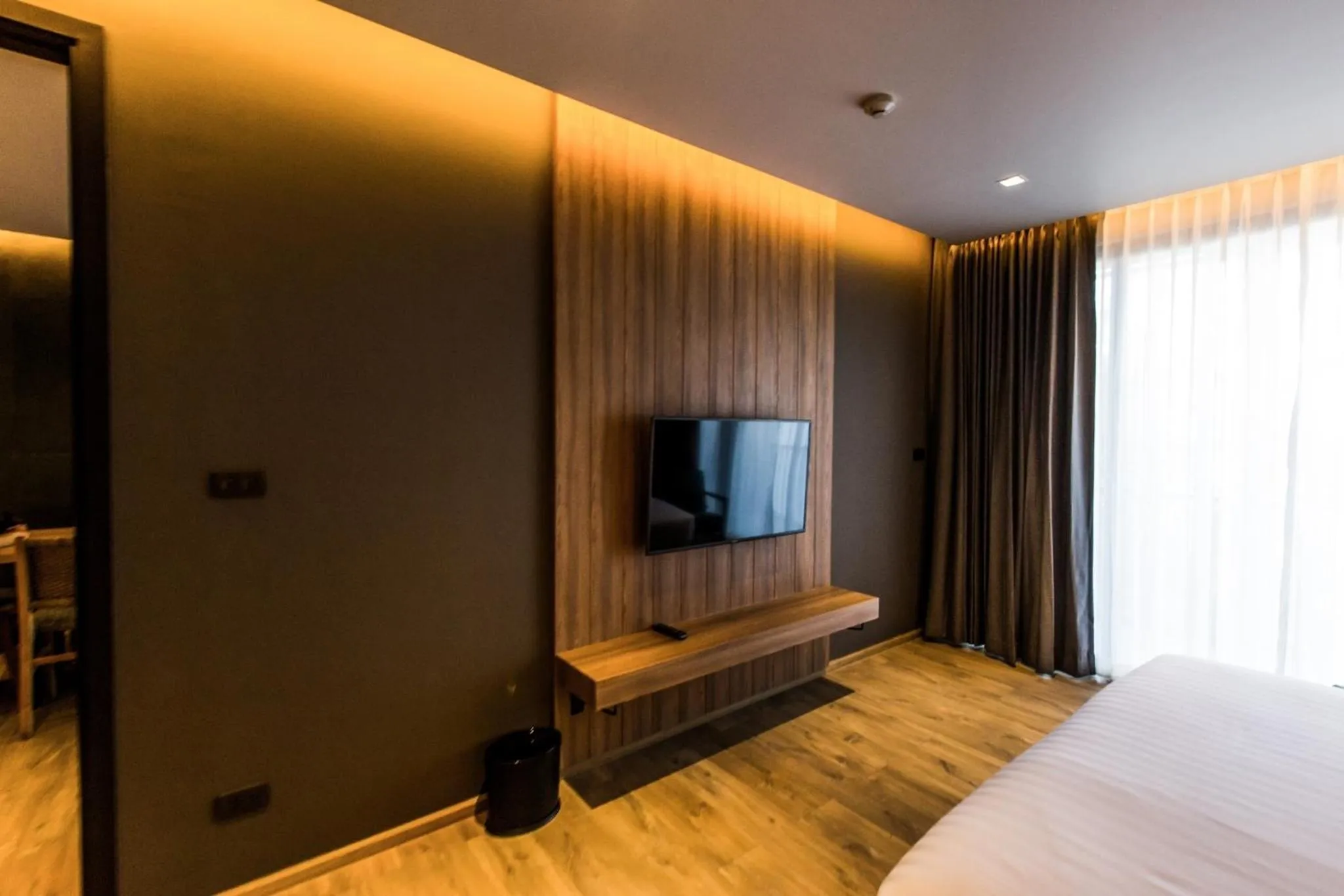 Bed in The Teak Hotel