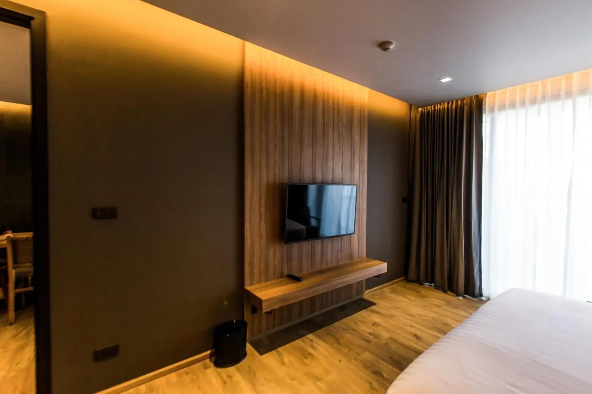 Bed in The Teak Hotel Bed in The Teak Hotel