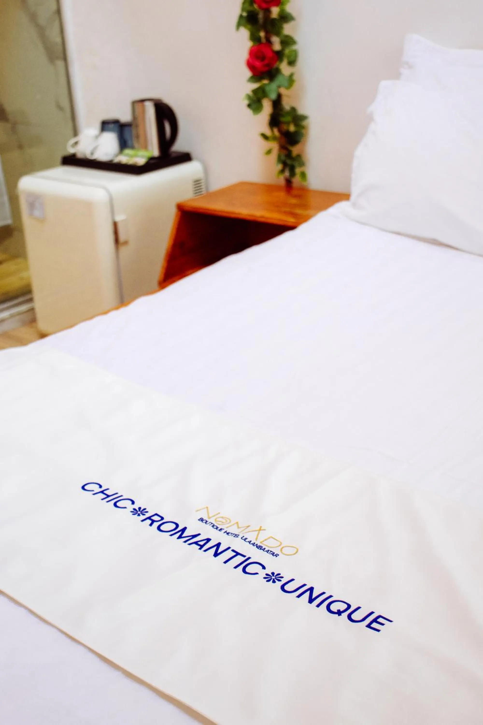 Bed in Nomado Boutique Hotel