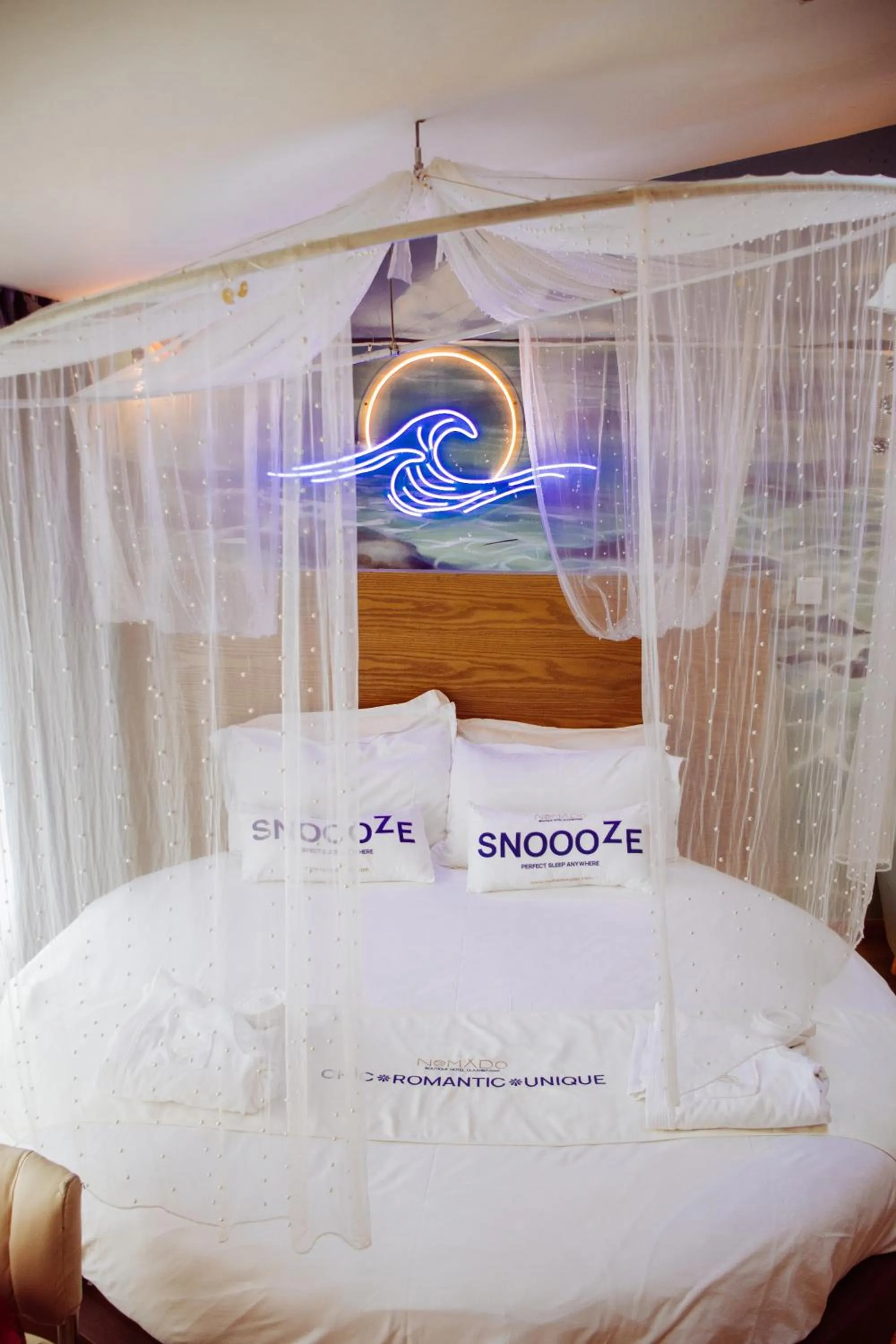 Bed in Nomado Boutique Hotel