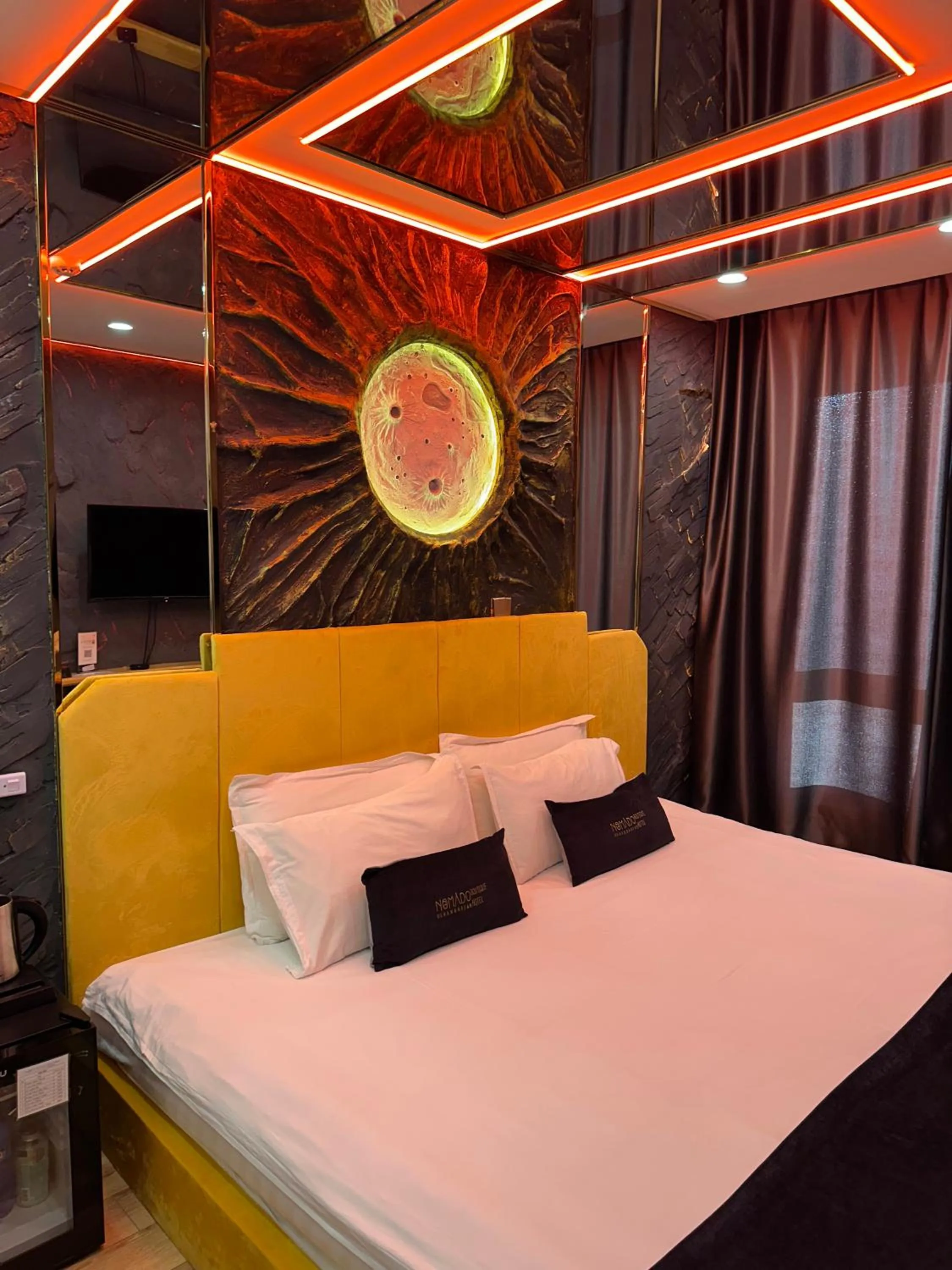 Bed in Nomado Boutique Hotel