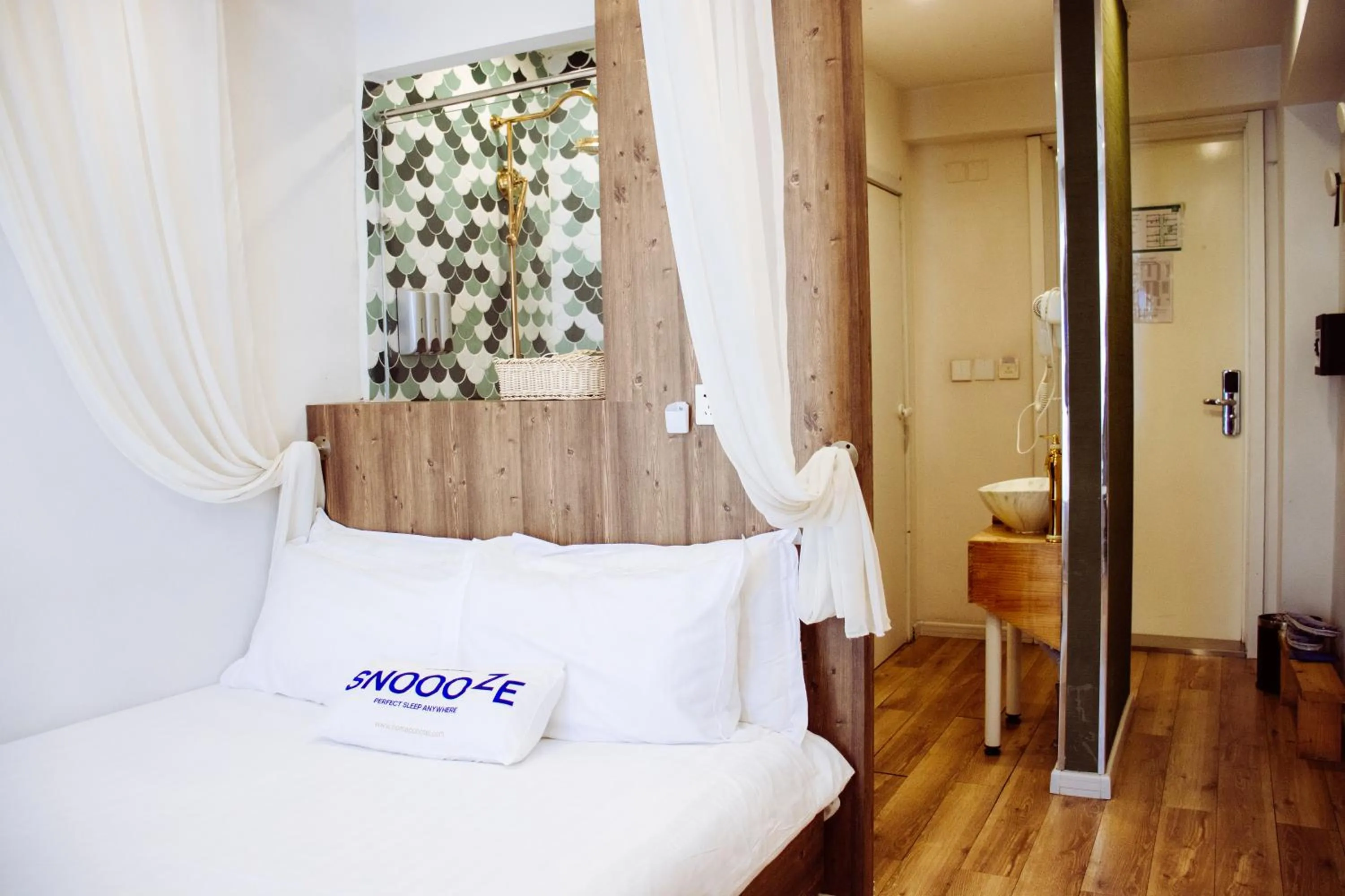 Bed in Nomado Boutique Hotel