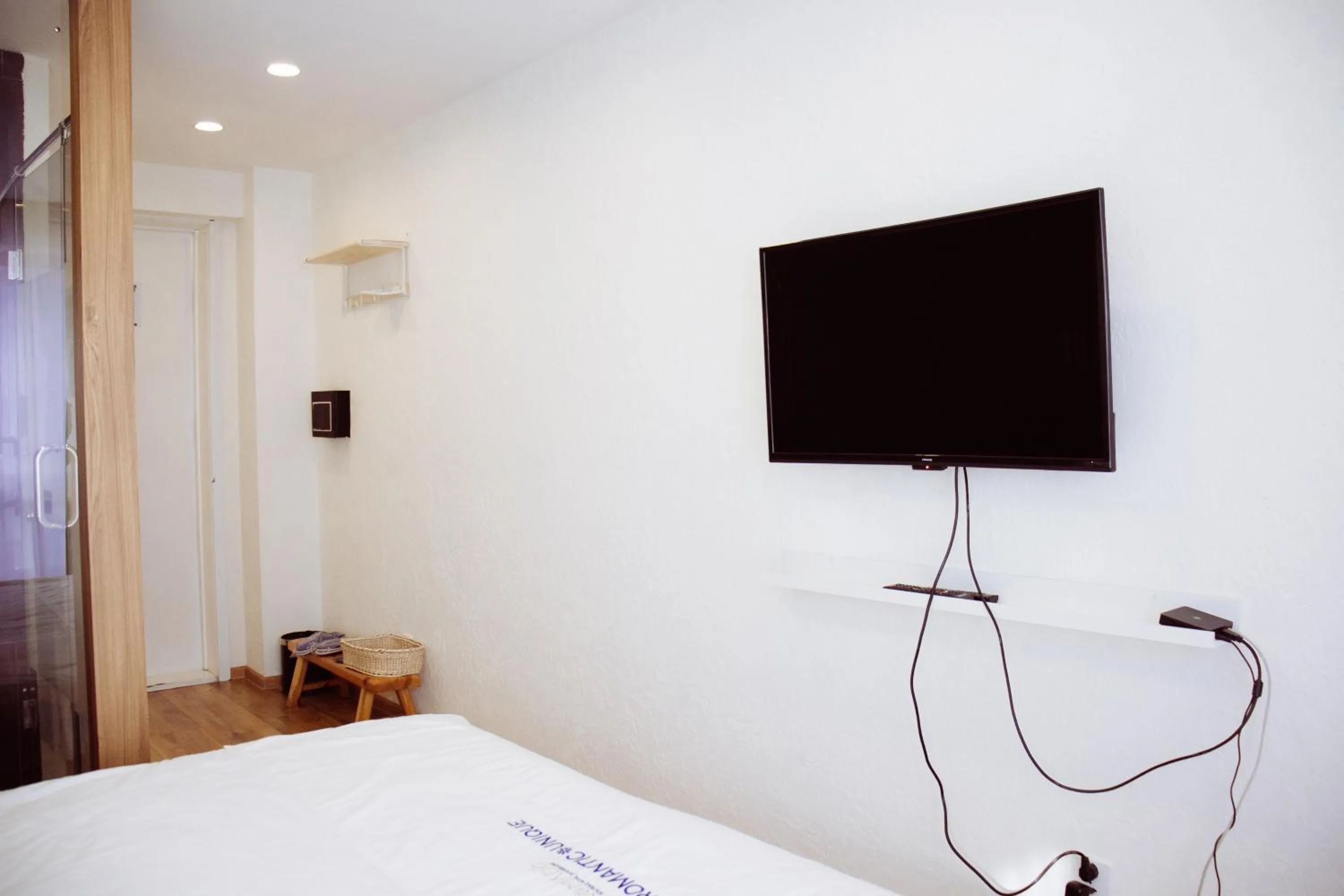 TV and multimedia, Bed in Nomado Boutique Hotel