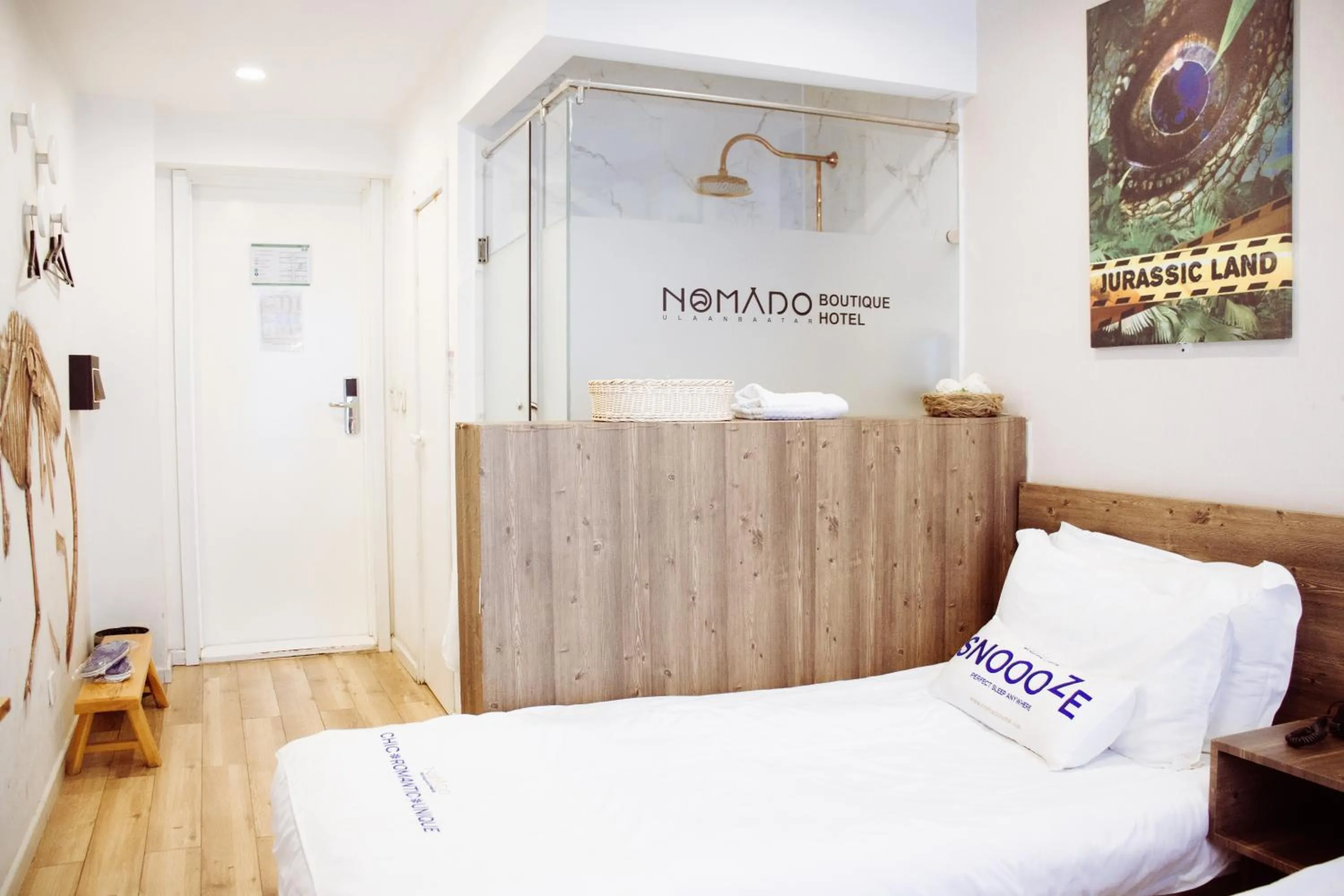 Bed in Nomado Boutique Hotel