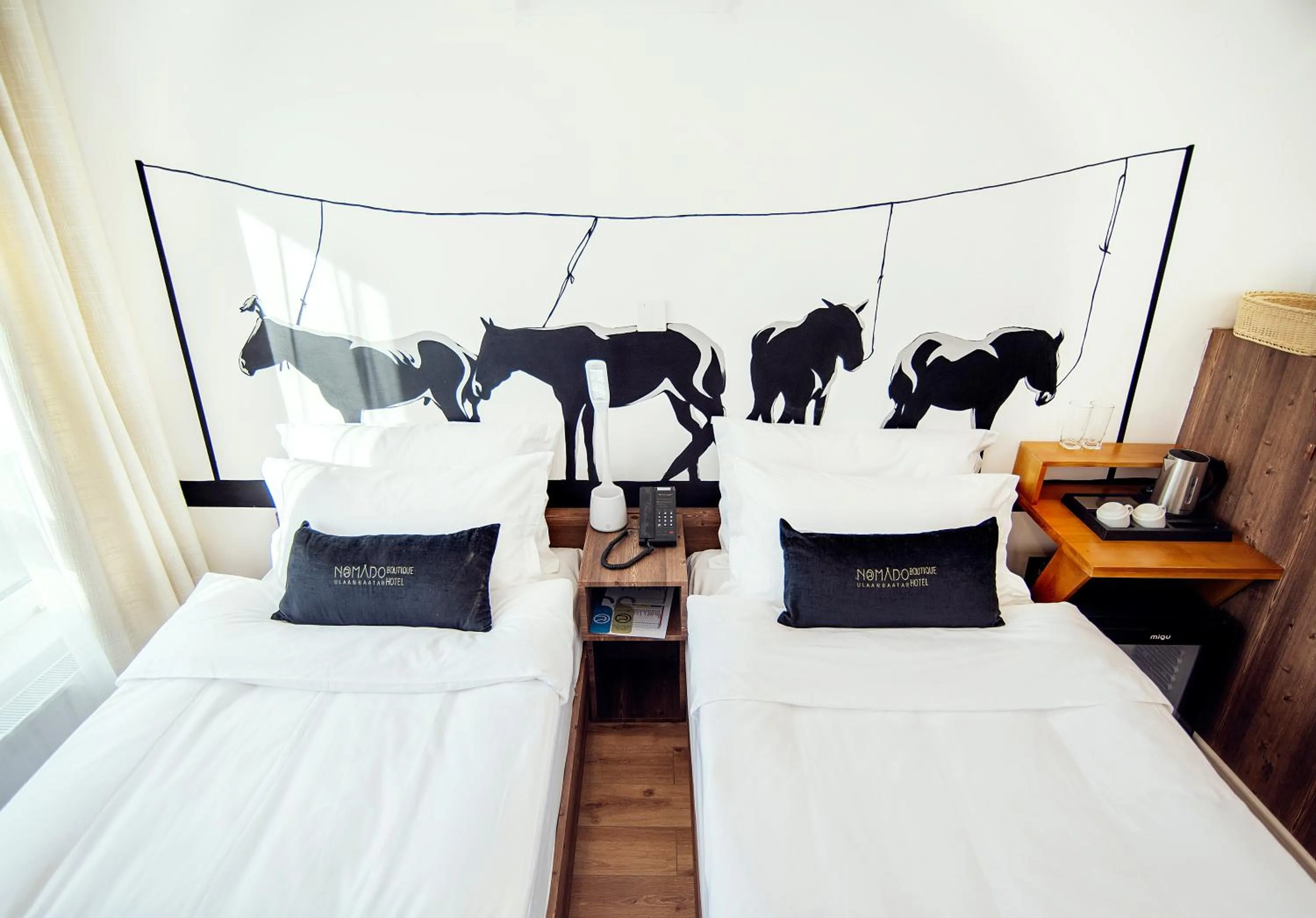 Bed in Nomado Boutique Hotel