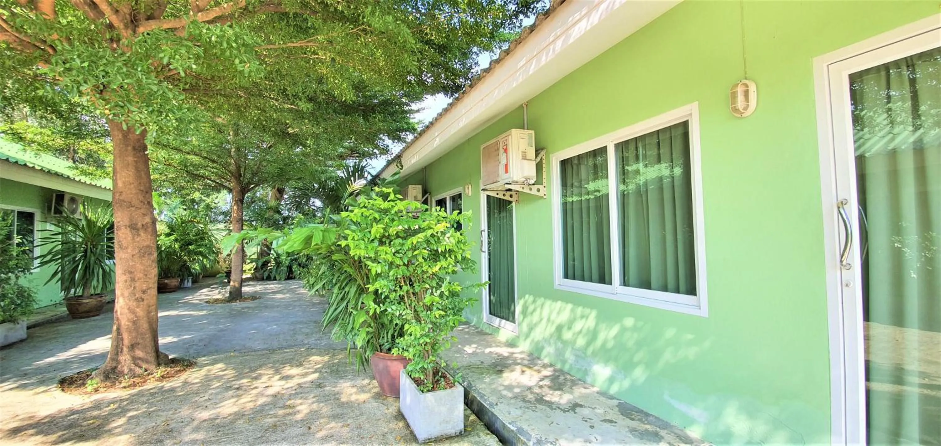 Facade/entrance in Chalong Stay Well by Palai Seafood