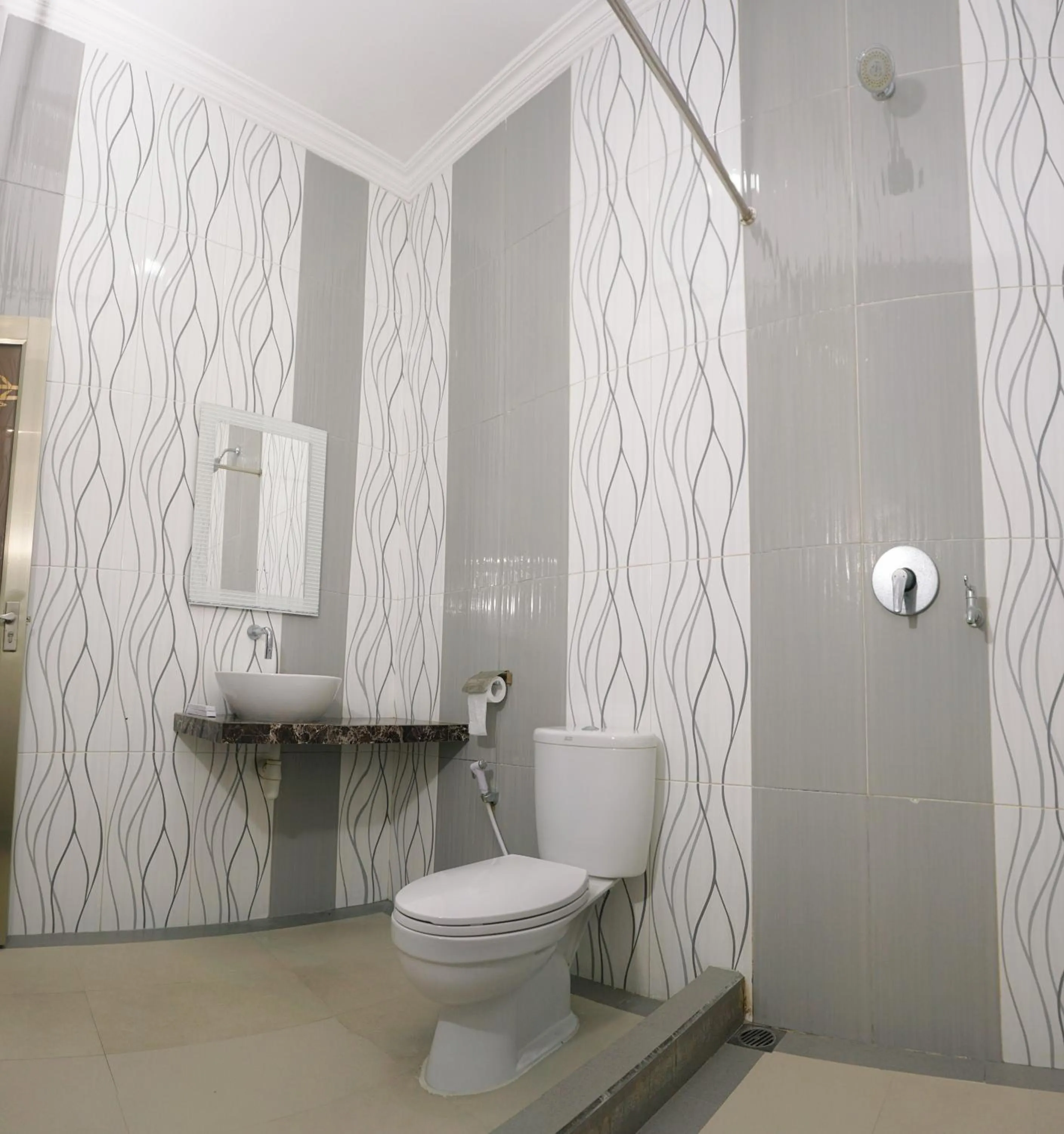 Bathroom in Musdalifah Hotel