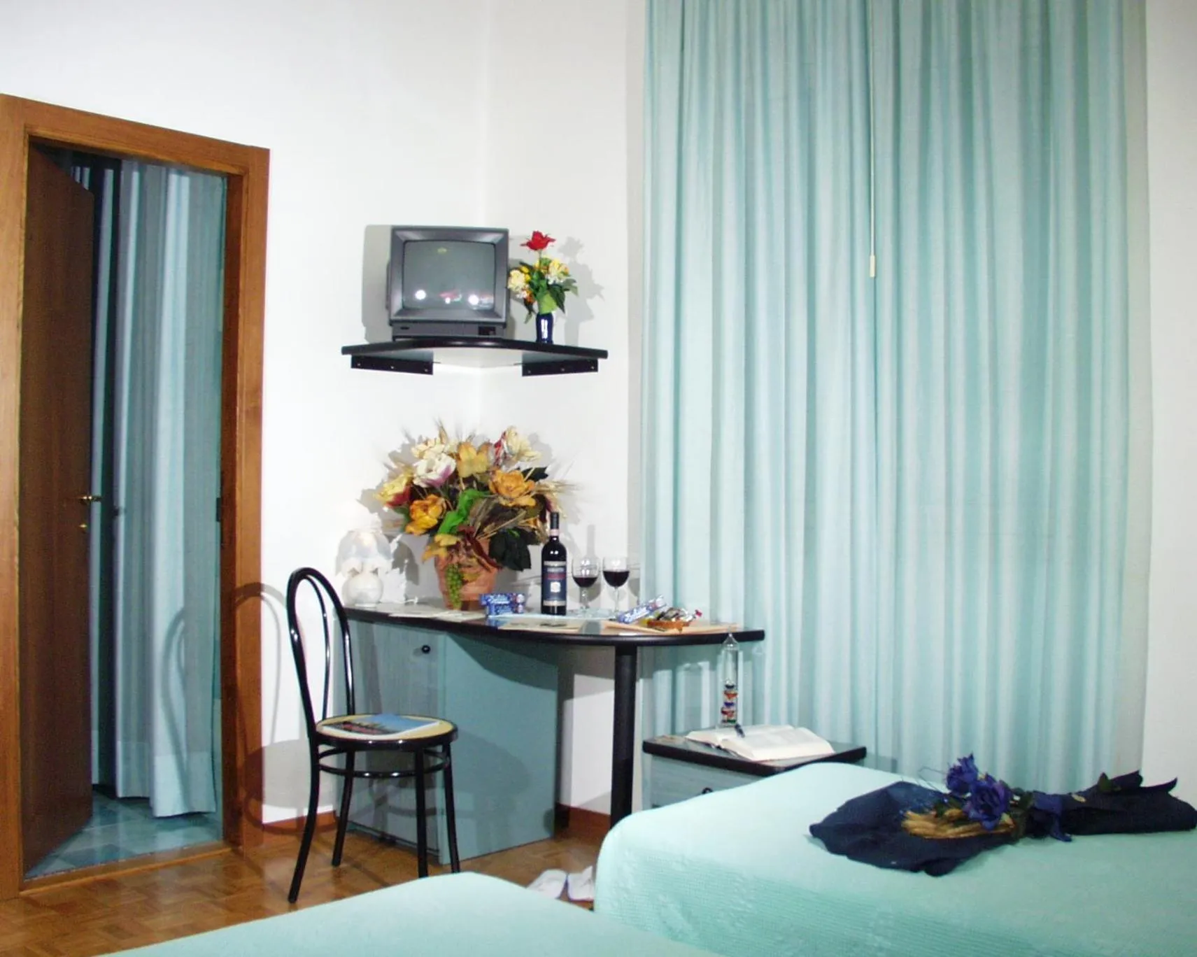 Bed in Hotel Paradiso