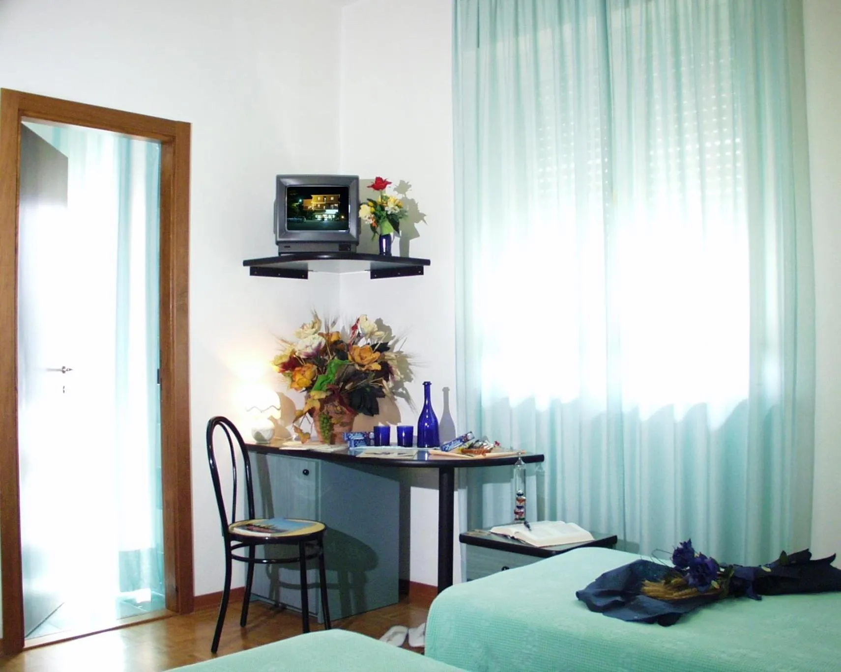 Bed in Hotel Paradiso