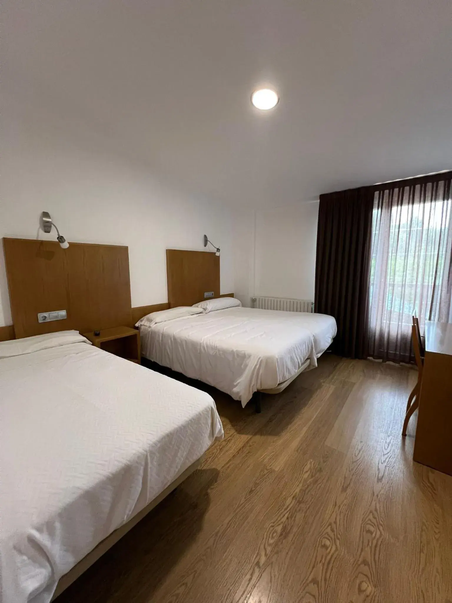 Triple Room in Hotel Lusitano Triple Room in Hotel Lusitano