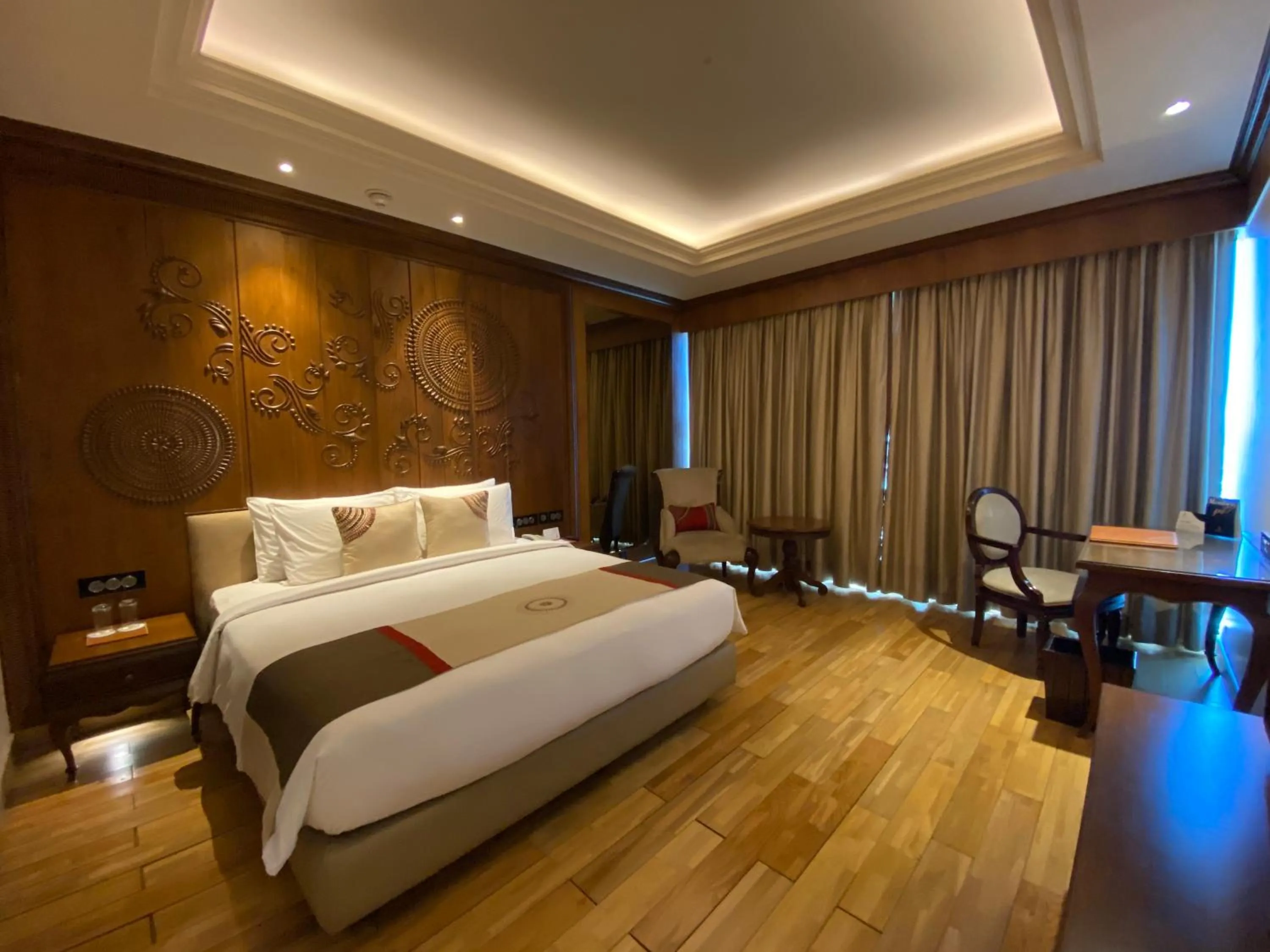 Bed in Seven Seas Hotel